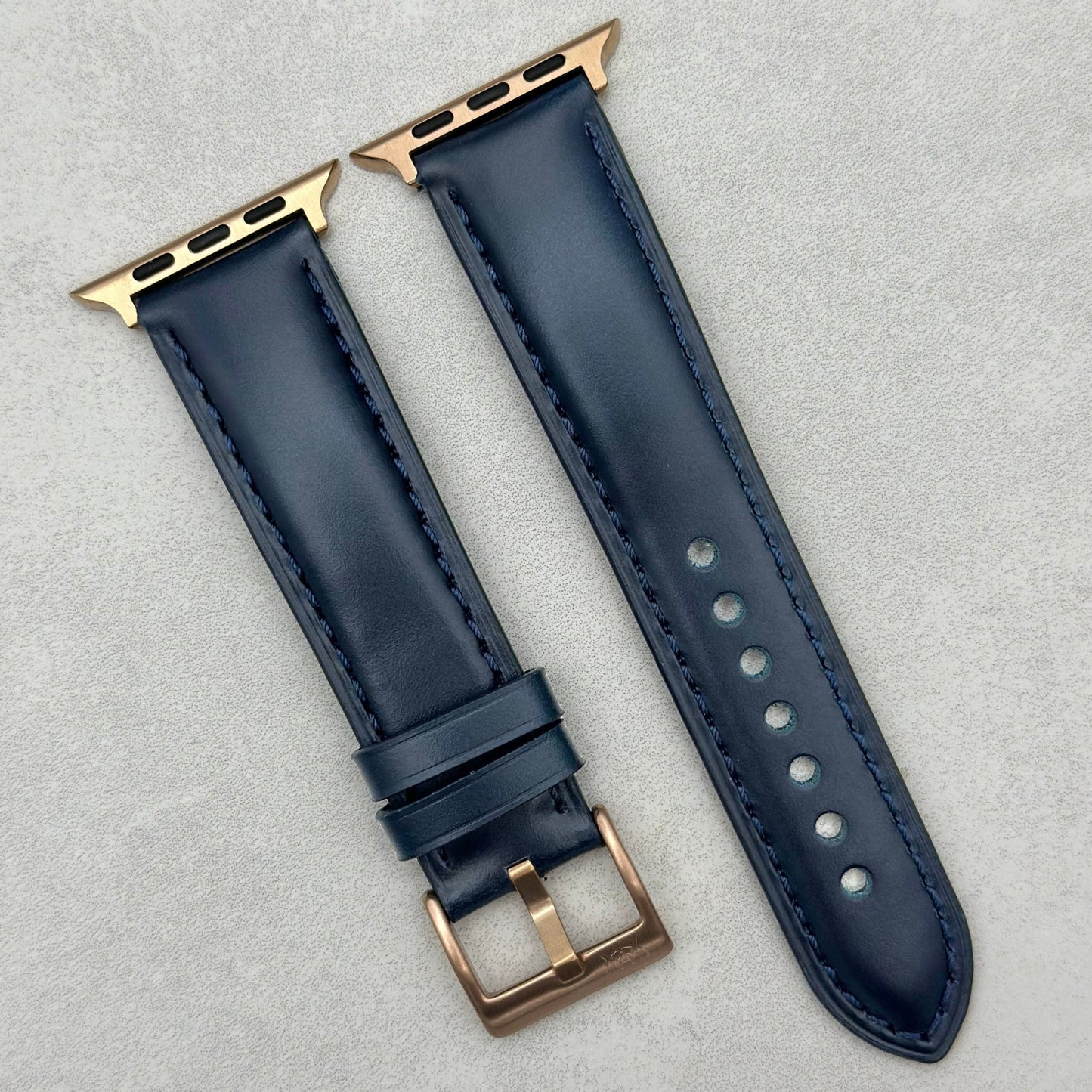Athens blue full grain leather Apple Watch strap with rose gold hardware.