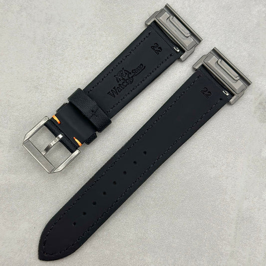 Rear of the Bermuda black sail cloth Garmin Quickfit watch strap with contrast orange stitching.