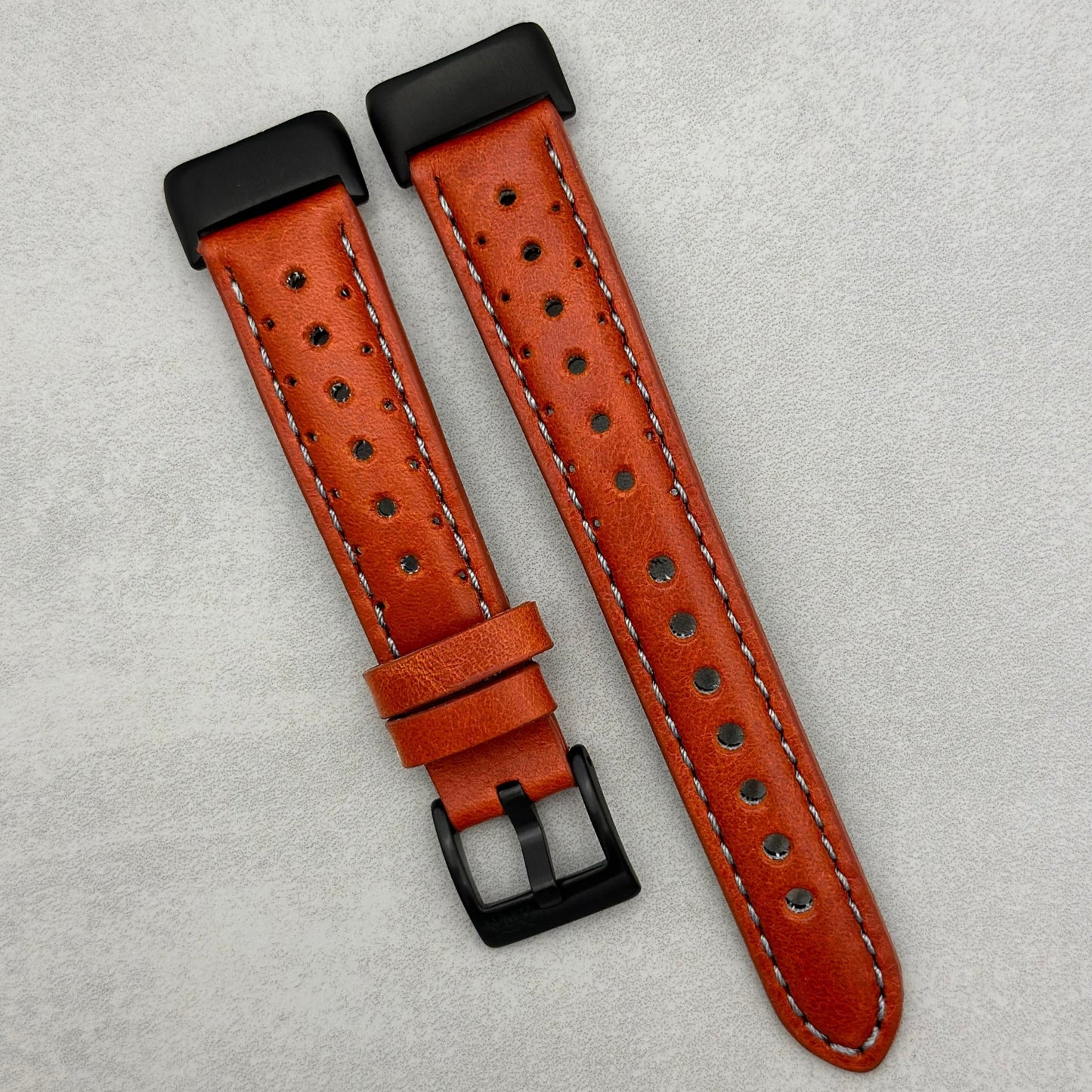 The Monte Carlo: Russet Orange Perforated Leather Fitbit Charge Watch Strap