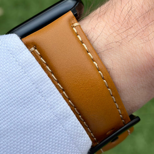Wrist shot of the Oslo tan full grain leather watch strap on the Apple Watch Series 9. Watch And Strap.