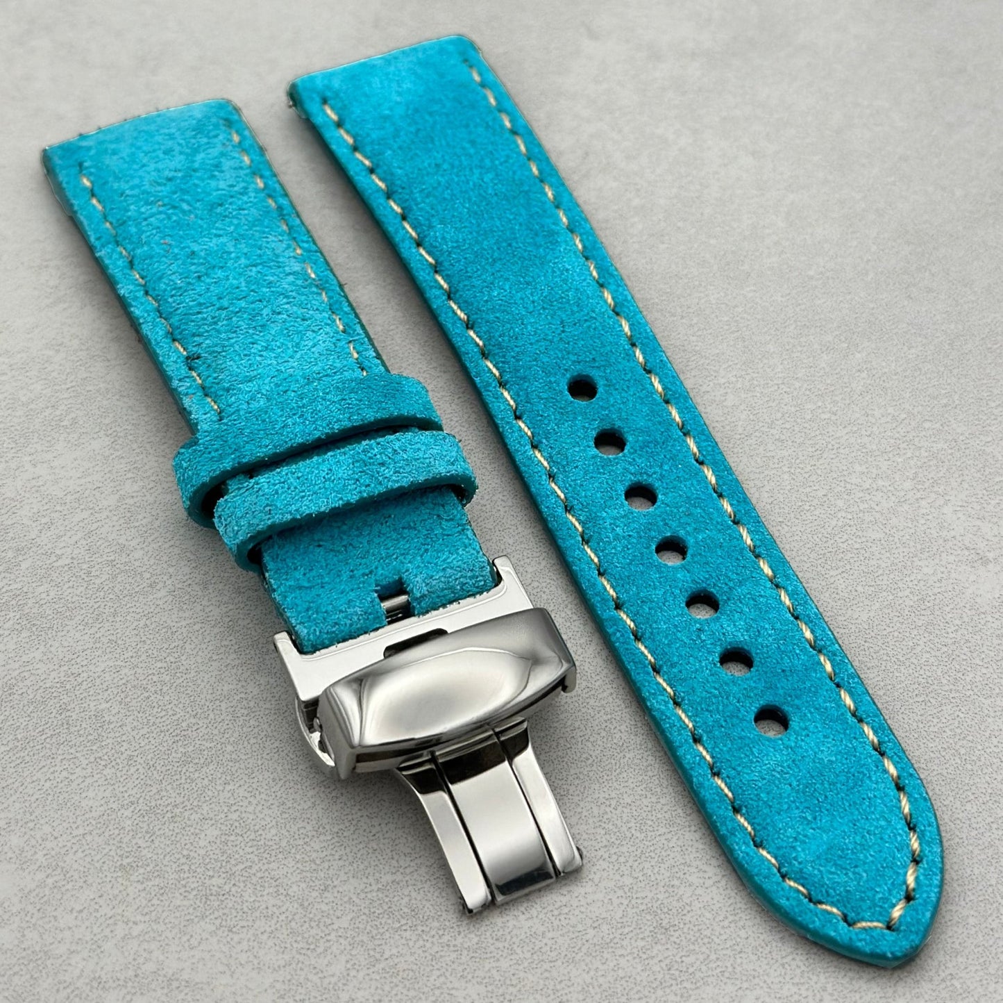 Paris turquoise suede watch strap fitted with a polished silver butterfly clasp. 18mm, 20mm, 22mm, 24mm. Watch And Strap