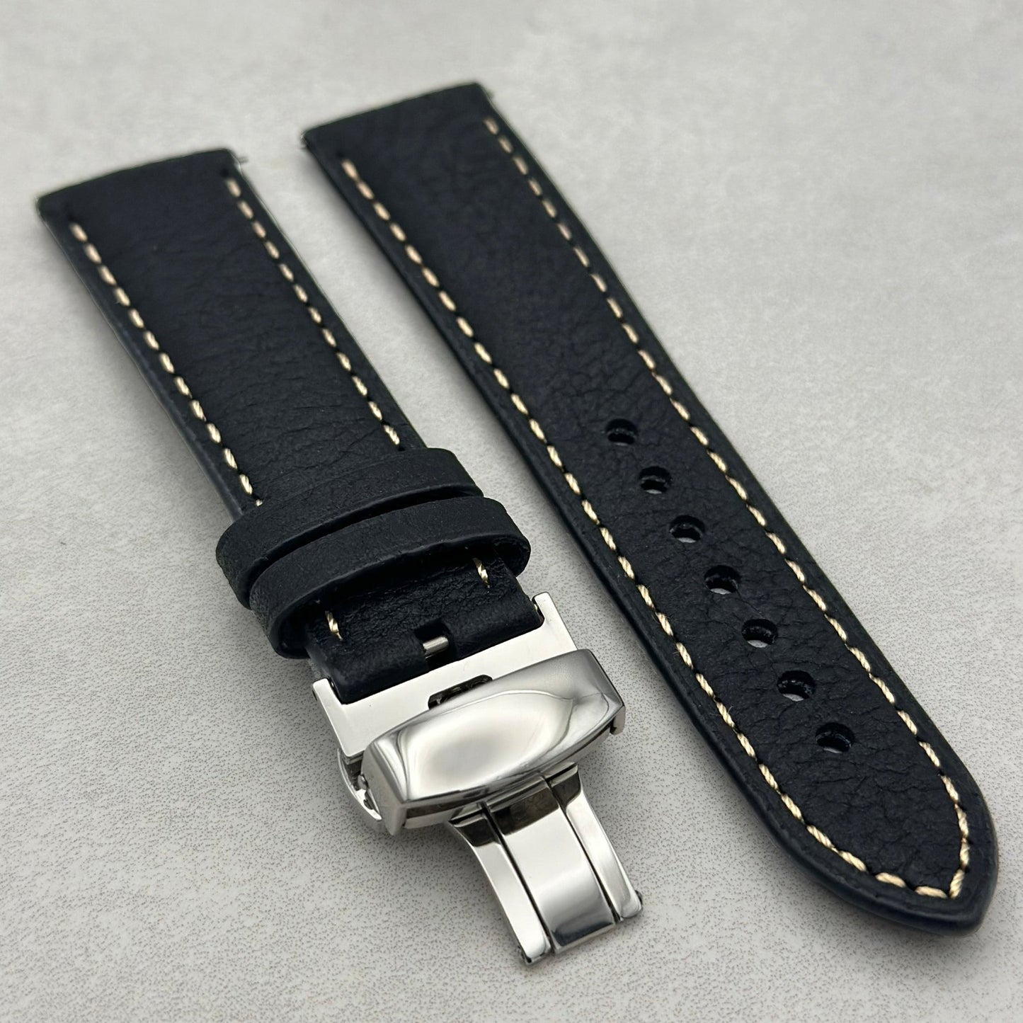 Rome black full grain leather watch strap with a polished stainless steel butterfly clasp.