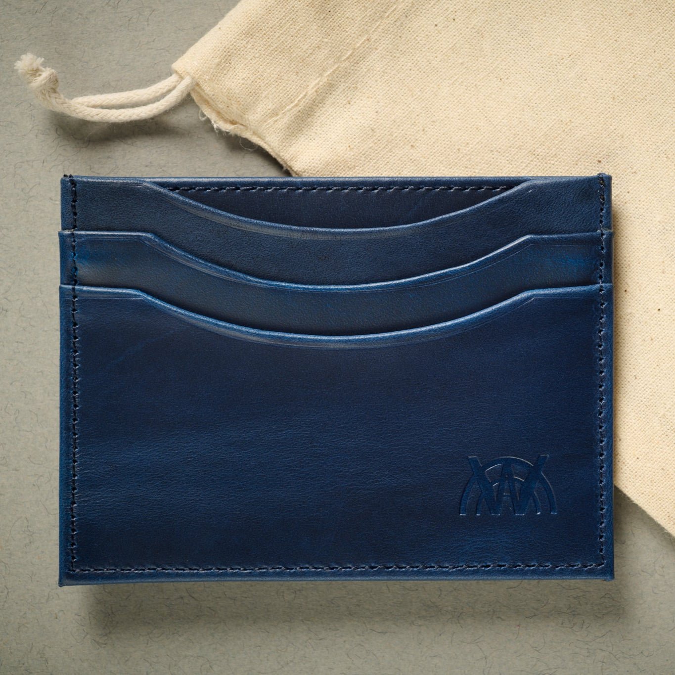 The Oxford Navy blue full grain calf skin card case. RFID blocking wallet with 5 card slots.