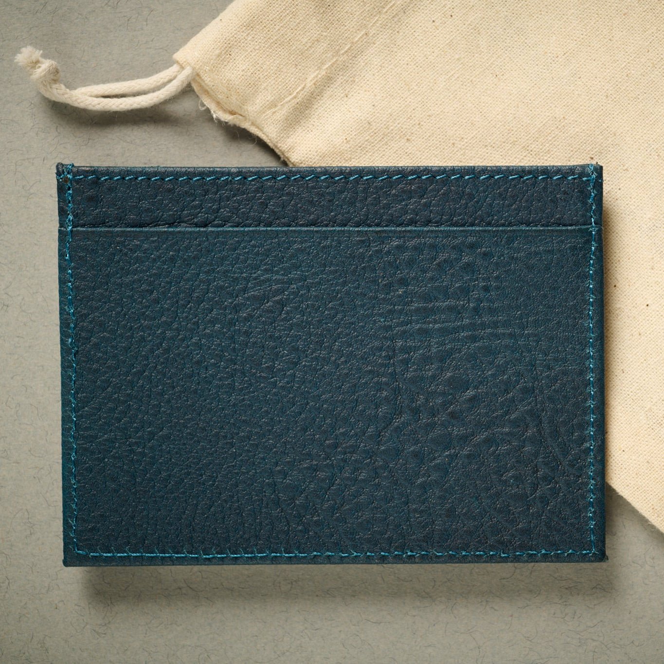 Rear of the Rome blue full grain Italian leather card case. RFID blocking card case. 5 card slots.