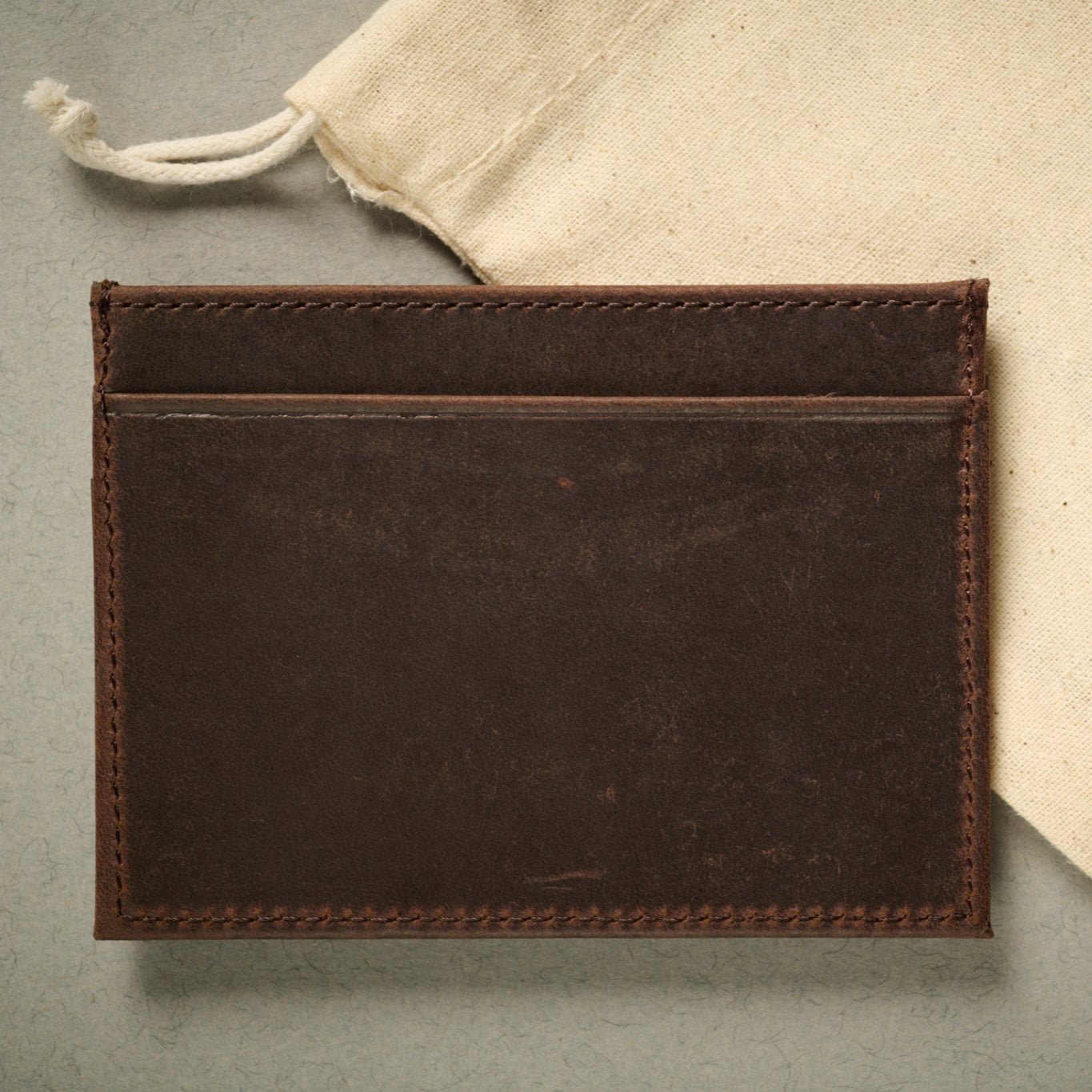Rear of the Oxford brown full grain calf skin card case. RFID blocking 5 card slots.