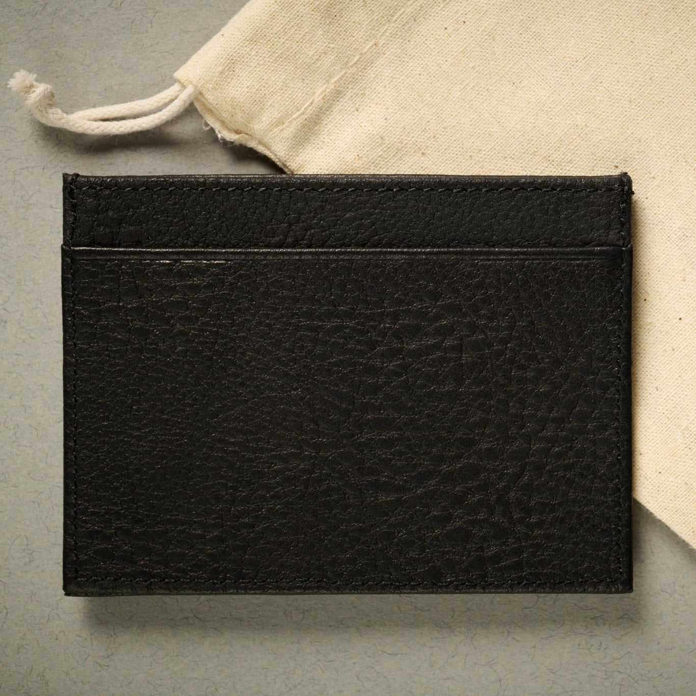 Rear of the Rome Black full grain Italian leather card case. RFID Blocking technology. 5 card slots.