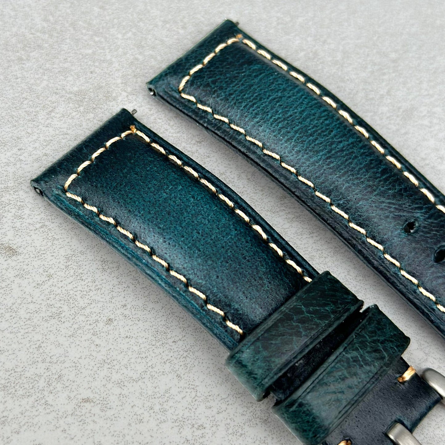 Top of the Berlin blue full grain leather watch strap. Electric blue leather. Contrast ivory stitching.