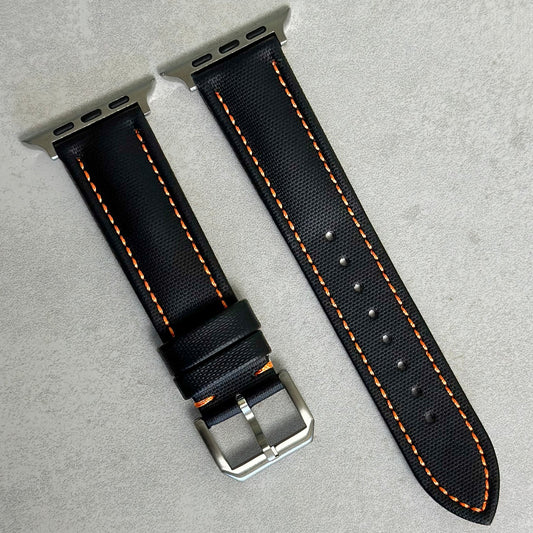 Jet black sail cloth Apple Watch strap with contrast orange stitching. Series 3, 4, 5, 6, 7, 8, 9, SE and Ultra.