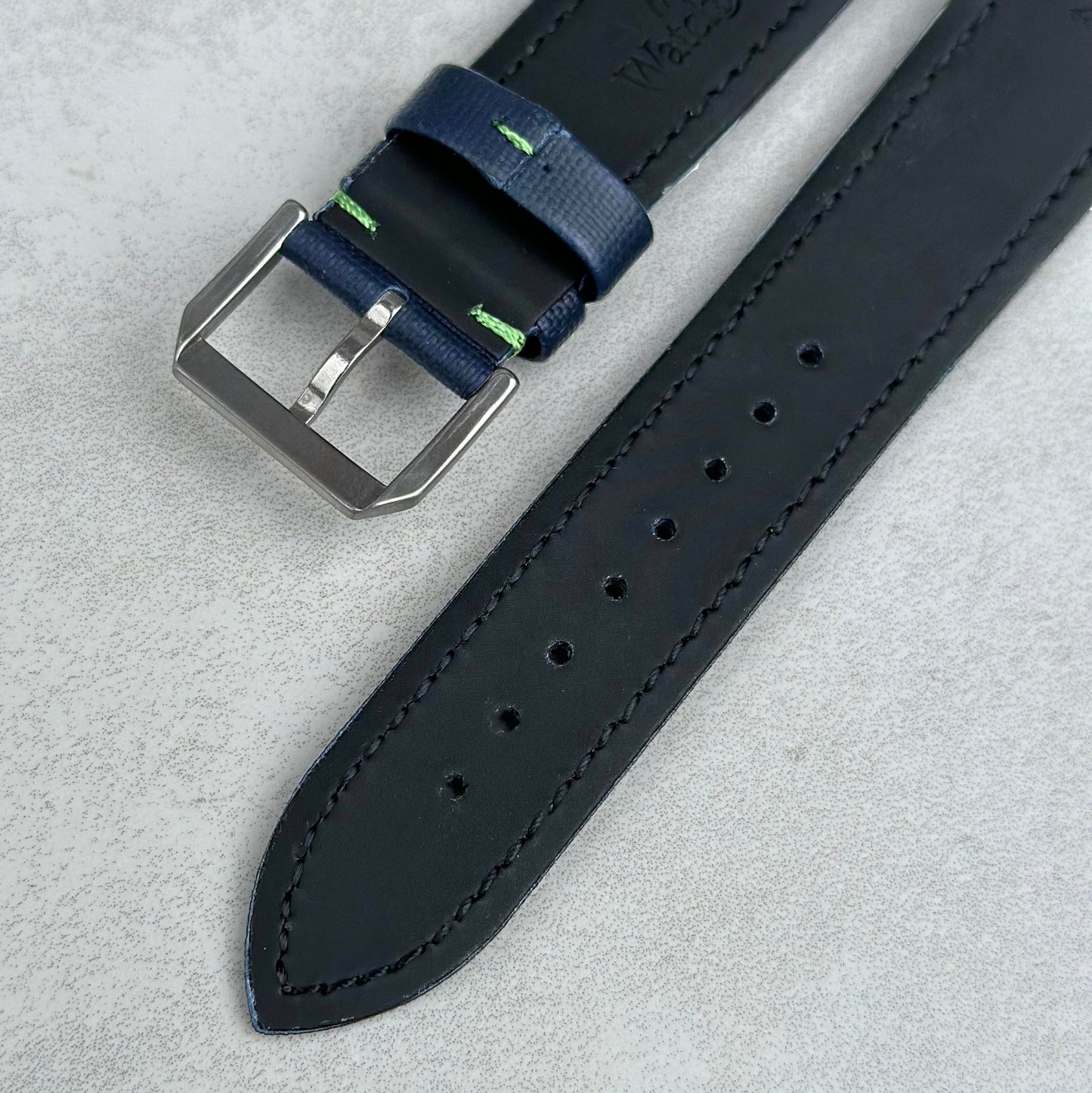 Brushed 316L stainless steel buckle on the Bermuda navy blue sail cloth watch strap with green stitching. Watch And Strap