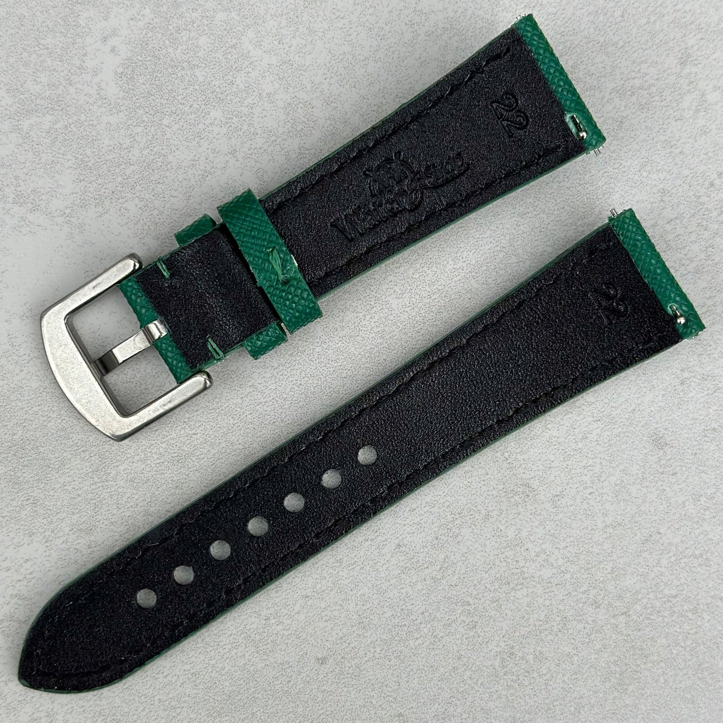 Rear of the Florence emerald green saffiano leather watch strap. Watch And Strap logo. Quick release pins.