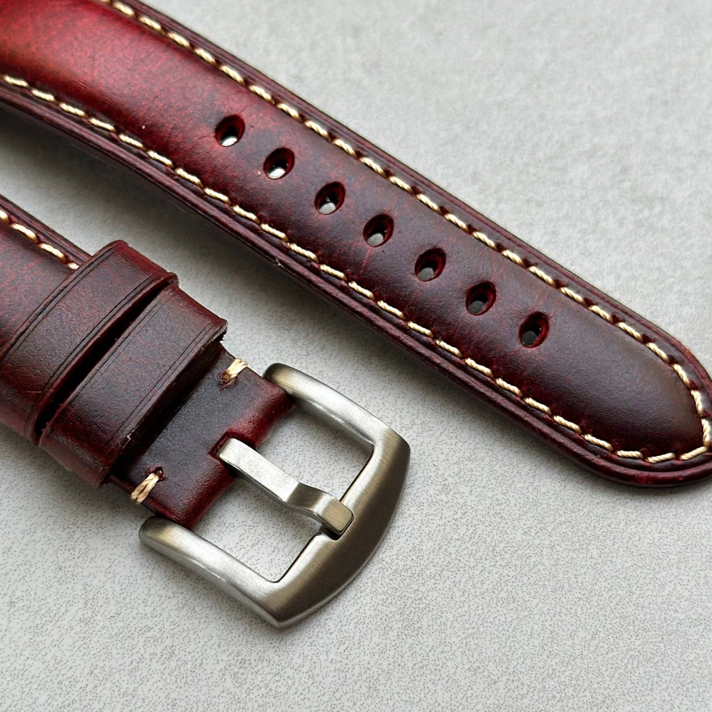 Brushed 316L stainless steel buckle on the Berlin burgundy full grain leather Apple Watch strap. Watch And Strap.
