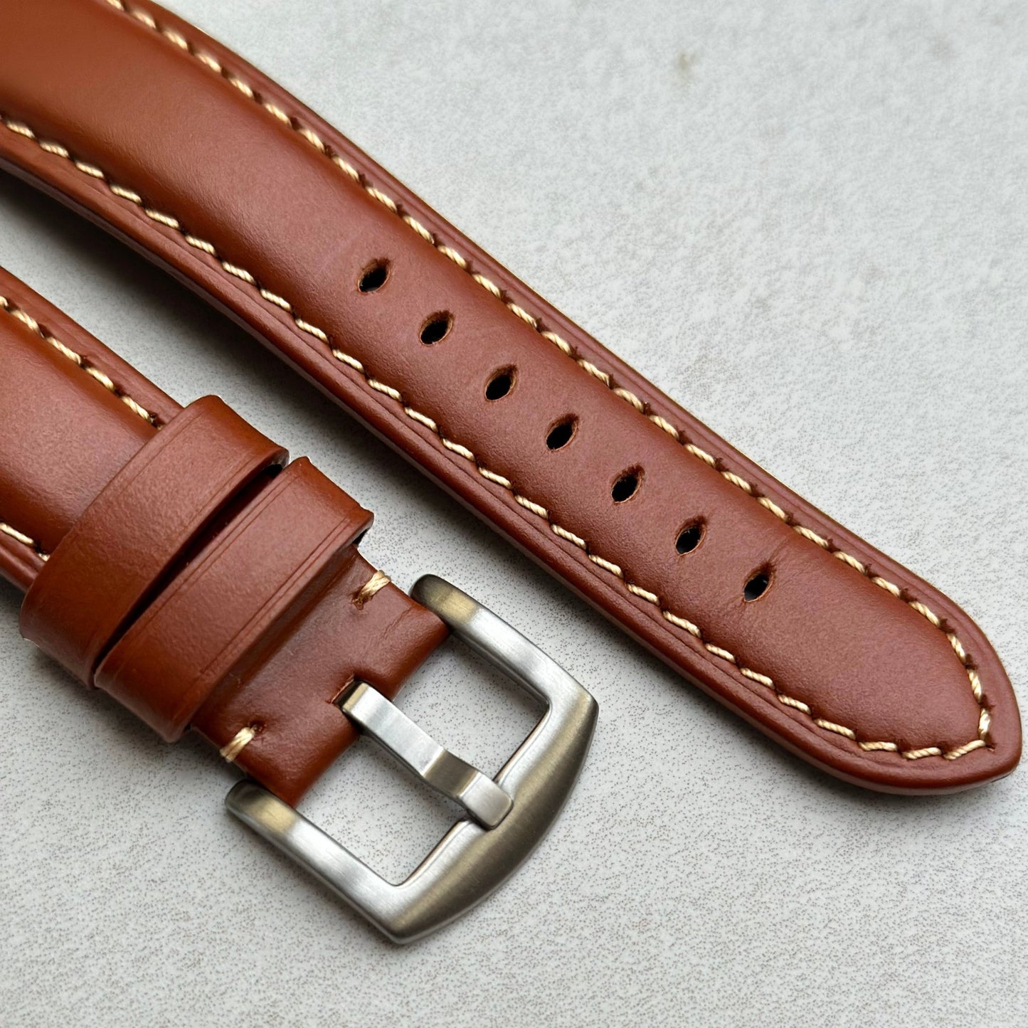 Brushed 316L stainless steel buckle on the Oslo caramel brown full grain leather watch strap. Watch And Strap