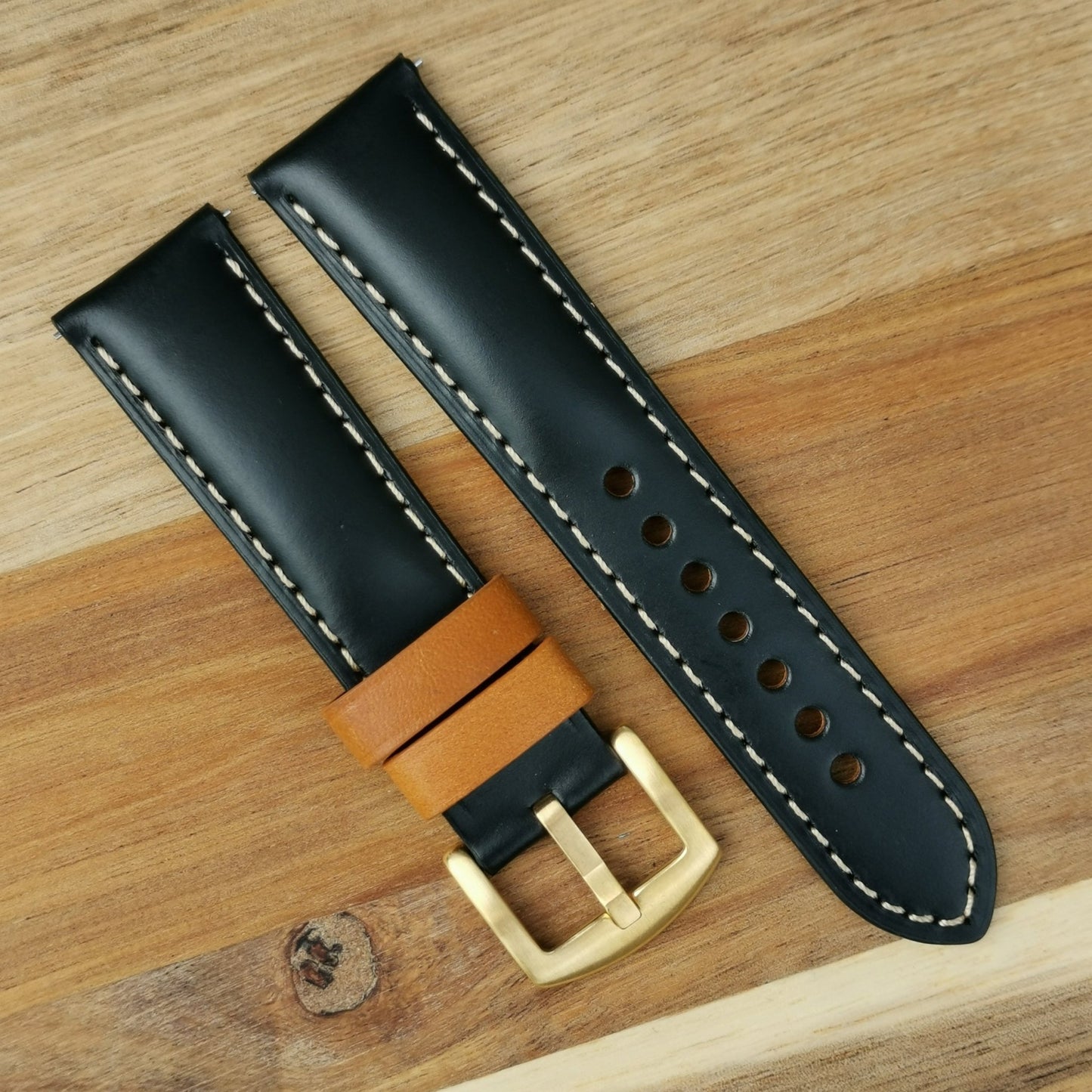 Oxford jet black full grain calf leather watch strap with a gold 316L stainless steel buckle. 18mm, 20mm, 22mm and 24mm.