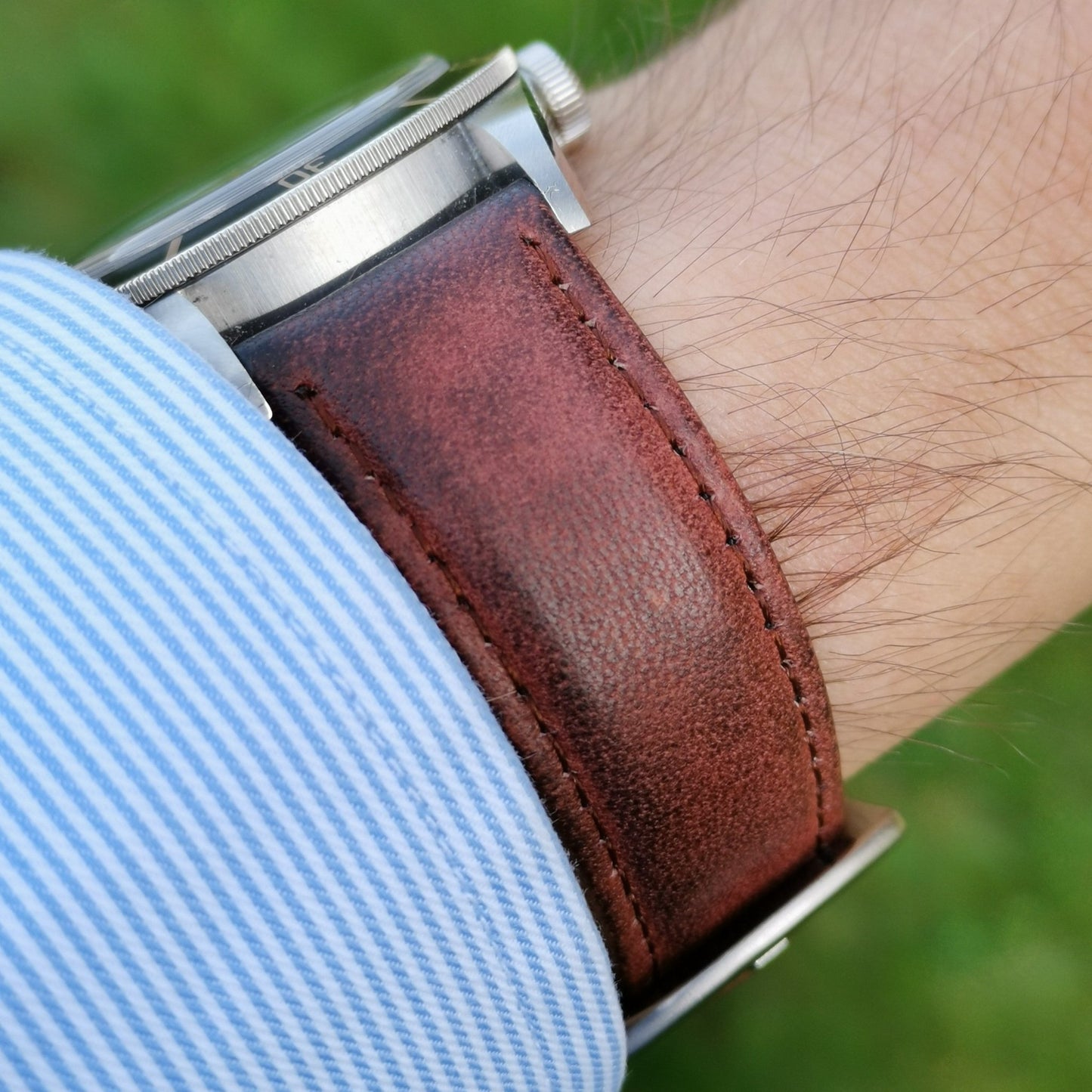 Wrist shot of the Milan brown vegetable tanned leather apple watch strap. Will fit Apple watch series 3, series 4, series 5, series 6, series 7, series 8, SE and ultra.