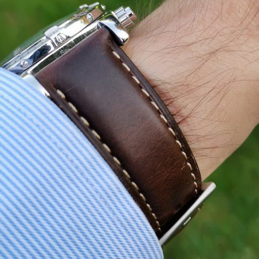 Wrist shot of the Oxford chocolate brown leather apple watch strap.