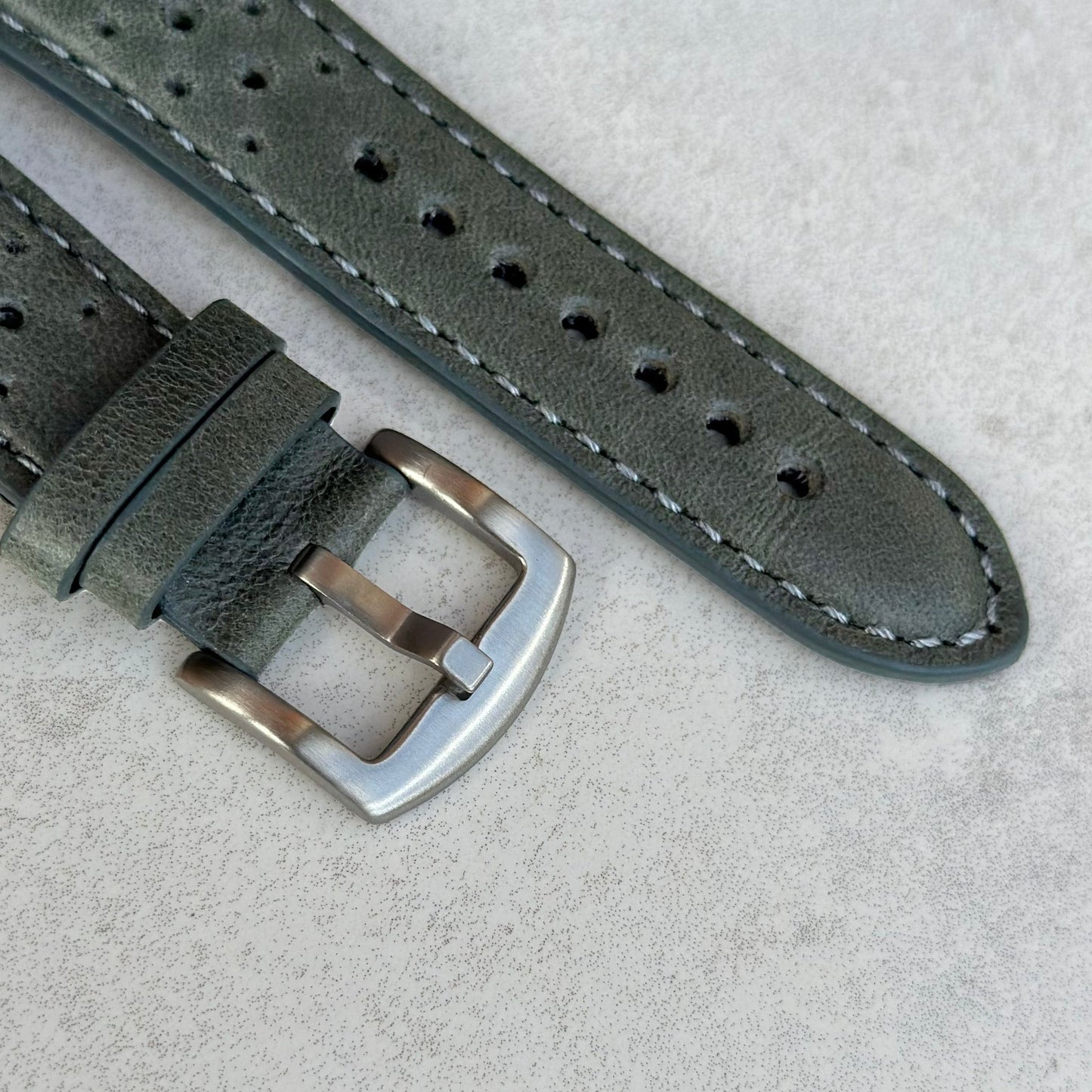 Brushed 316L stainless steel buckle on the Montecarlo grey perforated leather Apple Watch strap. Watch And Strap