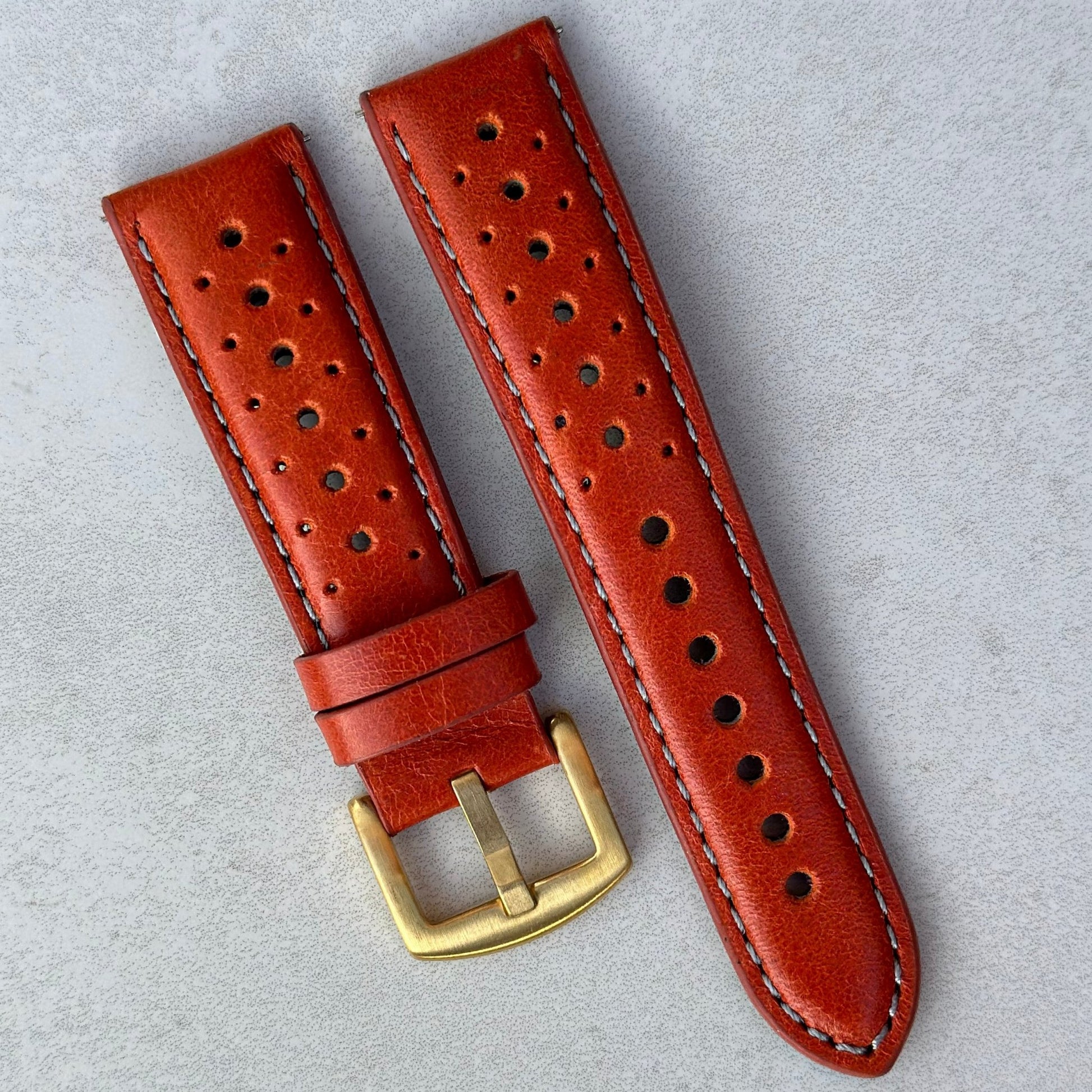 Montecarlo orange perforated leather watch strap. PVD gold stainless steel buckle. 18mm, 20mm, 22mm, 24mm. Watch And Strap
