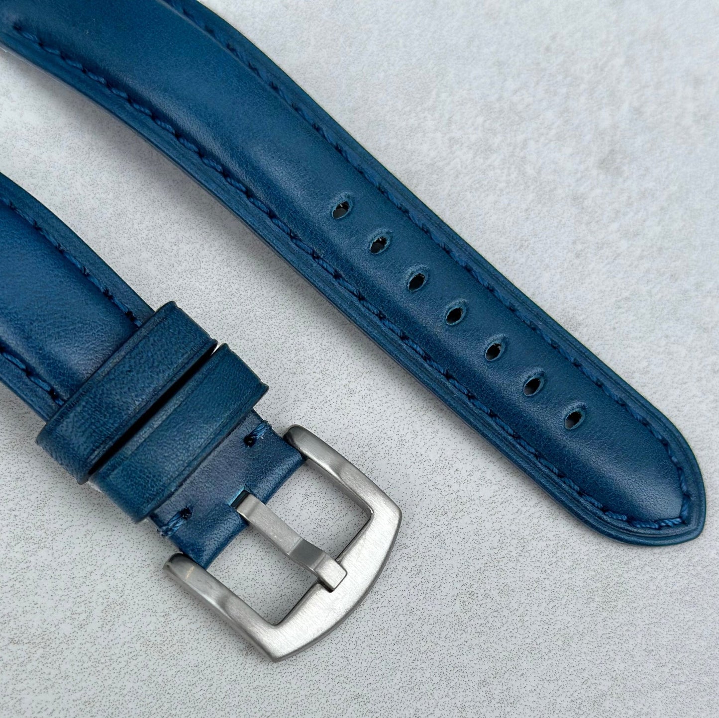 Brushed 316L stainless steel buckle on the Prague marine blue vegetable tanned leather watch strap. Watch And Strap.