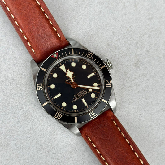 Rome terracotta brown full grain leather watch strap on the Tudor Blackbay 58. Ivory stitching. Watch And Strap.