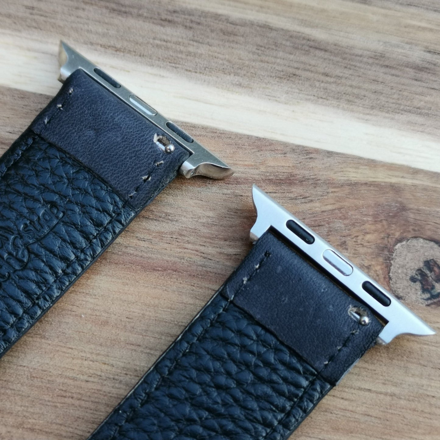 Underside of the Milan black leather apple watch.