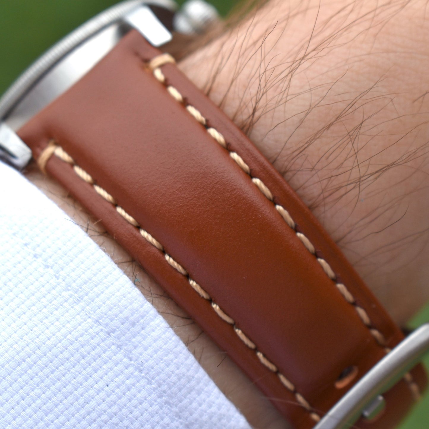 Wrist shot of the Oslo dark caramel brown leather watch band on the Tudor Blackbay 58. Extra Small, Extra Large.