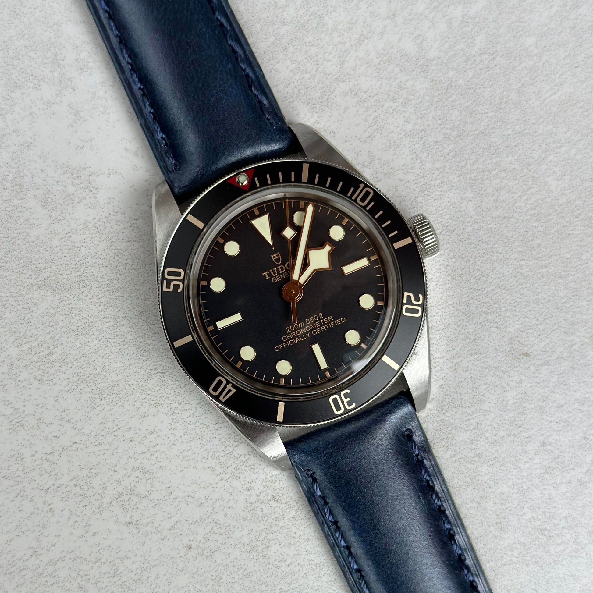 Deep ocean blue full grain leather watch strap on the Tudor Blackbay 58. Padded leather watch strap. Watch And Strap