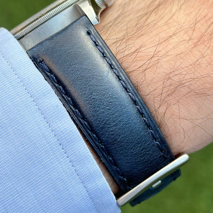 Wrist shot of the deep ocean blue full grain leather watch strap on the Tudor Blackbay 58. Watch And Strap