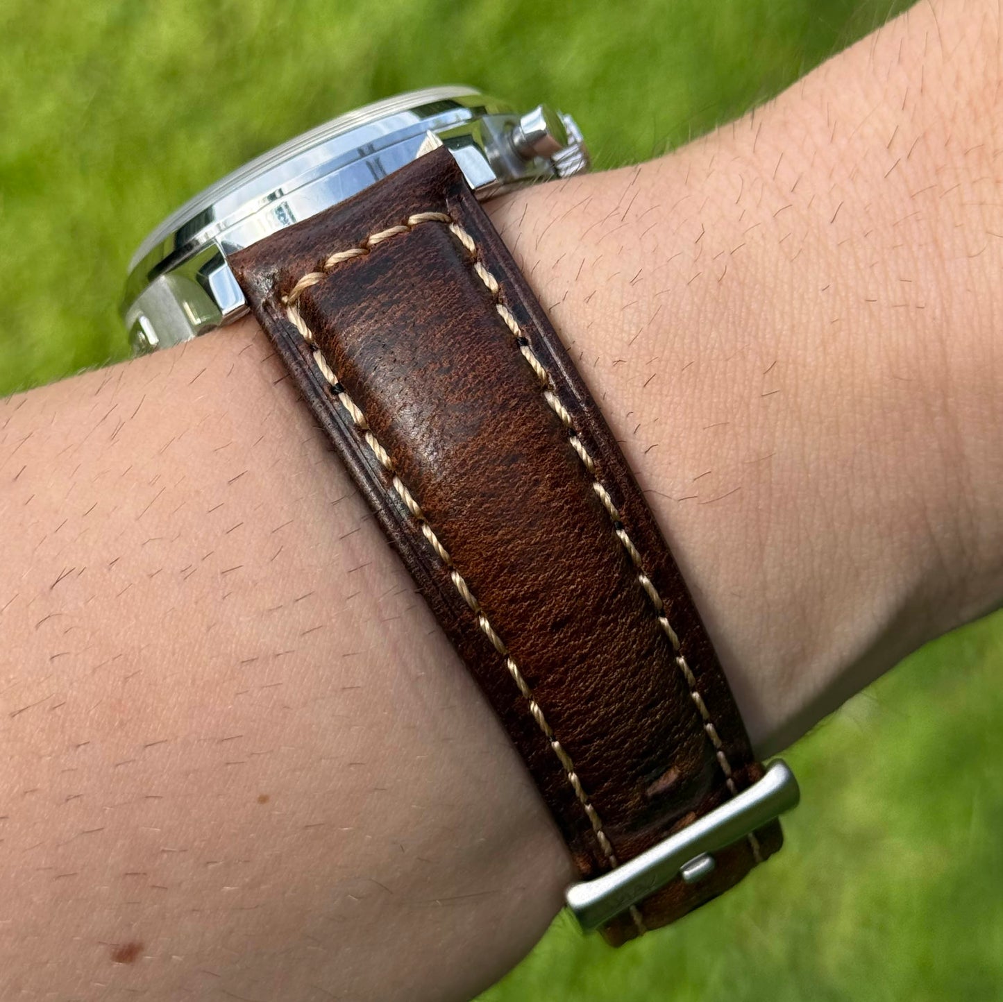 Wrist shot of the Berlin tobacco brown full grain leather watch strap. 18mm, 19mm, 20mm, 21mm, 22mm, 24mm. Watch And Strap.