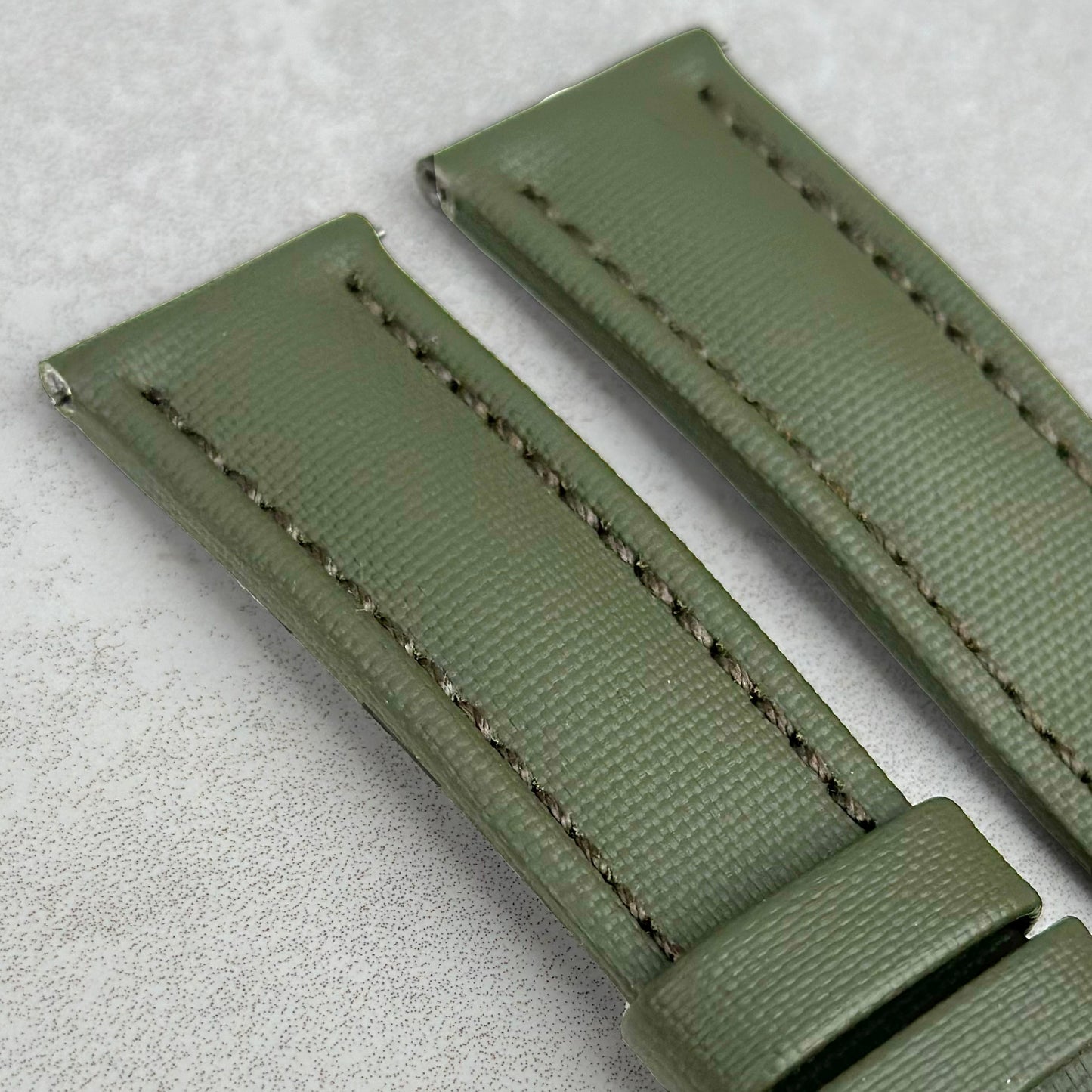 Top of the Bermuda khaki green sail cloth watch strap. Padded sail cloth strap. Watch And Strap.