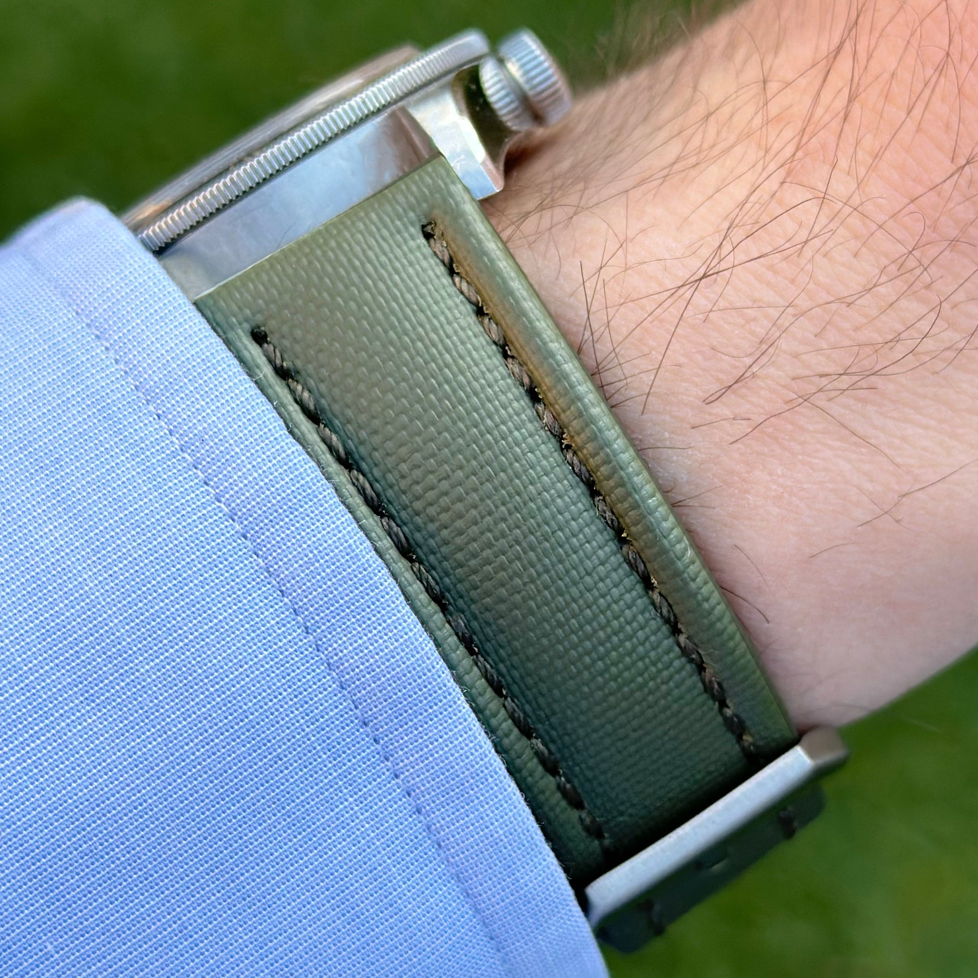 Wrist shot of the Bermuda khaki green sail cloth watch strap. Padded sail cloth strap. 20mm, 22mm. Watch And Strap.