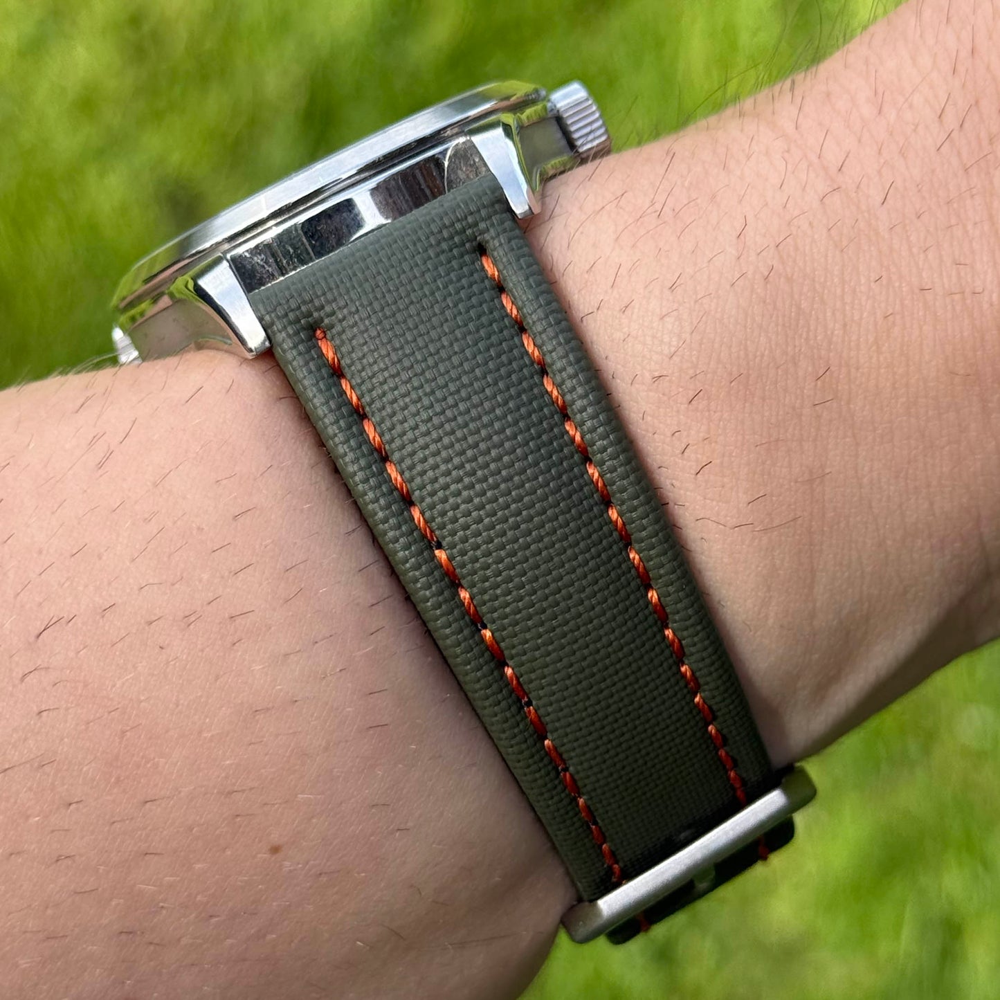 Wrist shot of the Bermuda khaki sailcloth watch strap with contrast ivory stitching. 19mm, 20mm, 21mm, 22mm.
