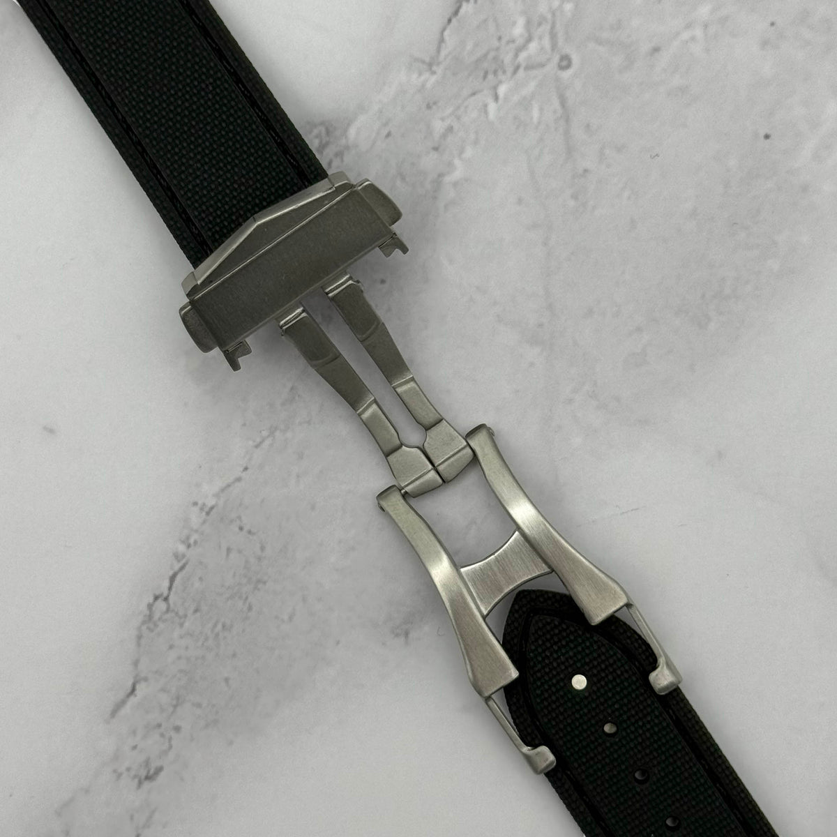 Jet black FKM rubber watch strap. 316L stainless steel deployant clasp. Quick release pins. 20mm, 22mm.