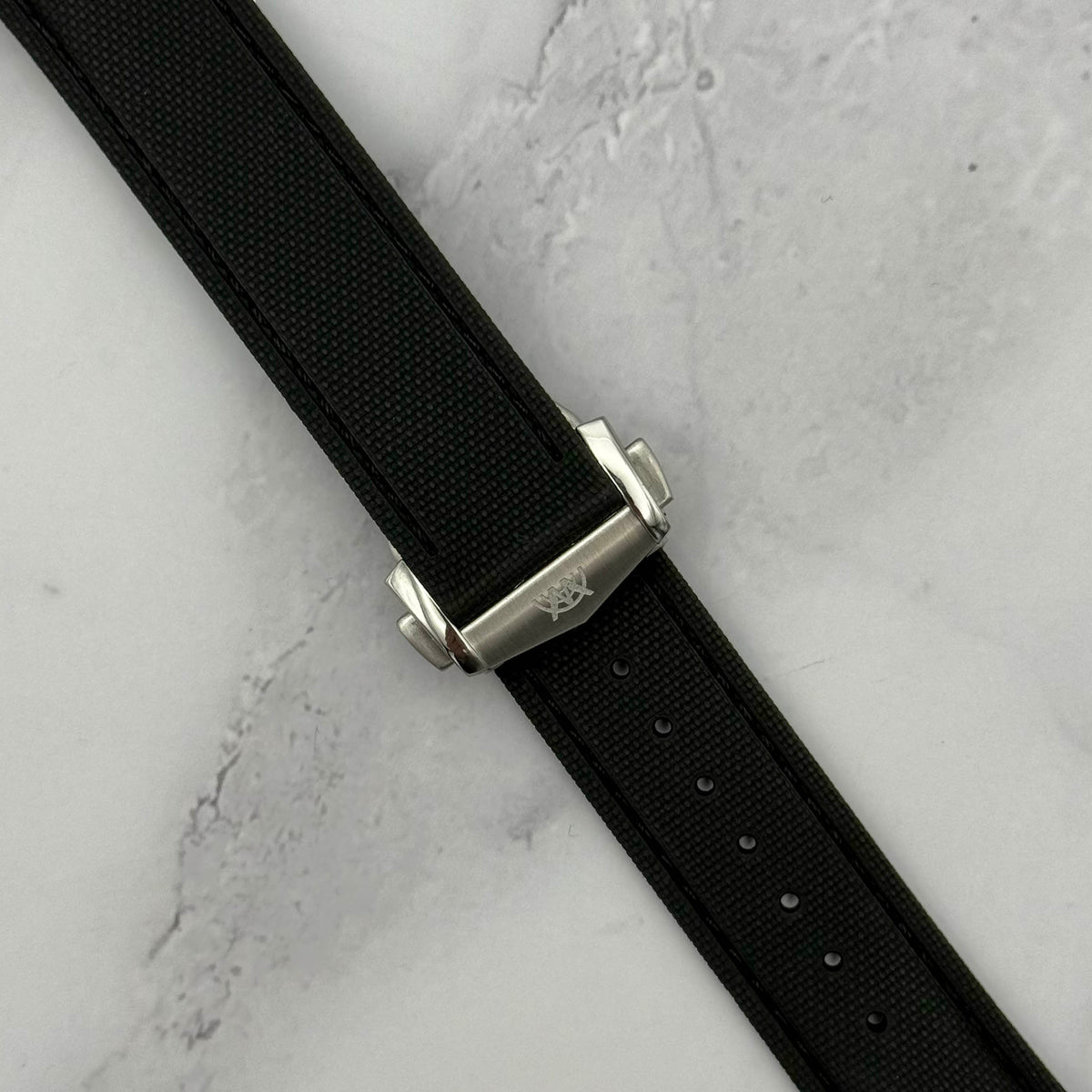 Jet black FKM rubber watch strap. 316L stainless steel deployant clasp. Quick release pins. 20mm, 22mm.