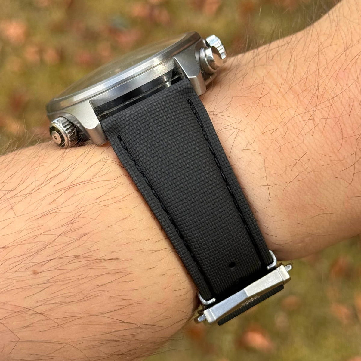 Jet black FKM rubber watch strap. 316L stainless steel deployant clasp. Quick release pins. 20mm, 22mm.