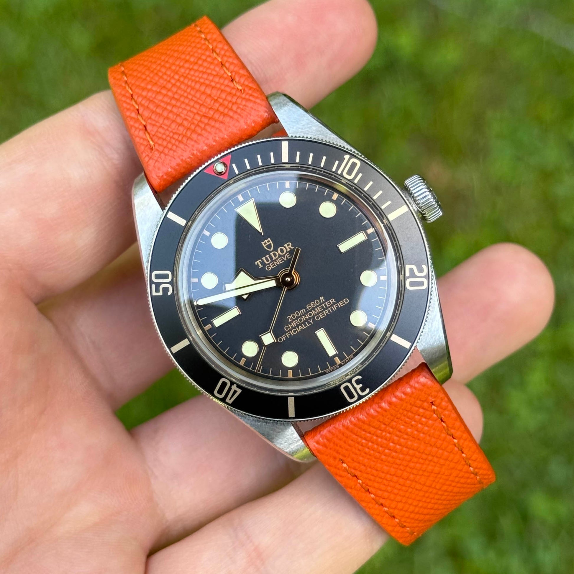 Wrist shot of the Florence orange saffiano leather watch strap. 18mm, 20mm, 22mm, 24mm. Watch And Strap