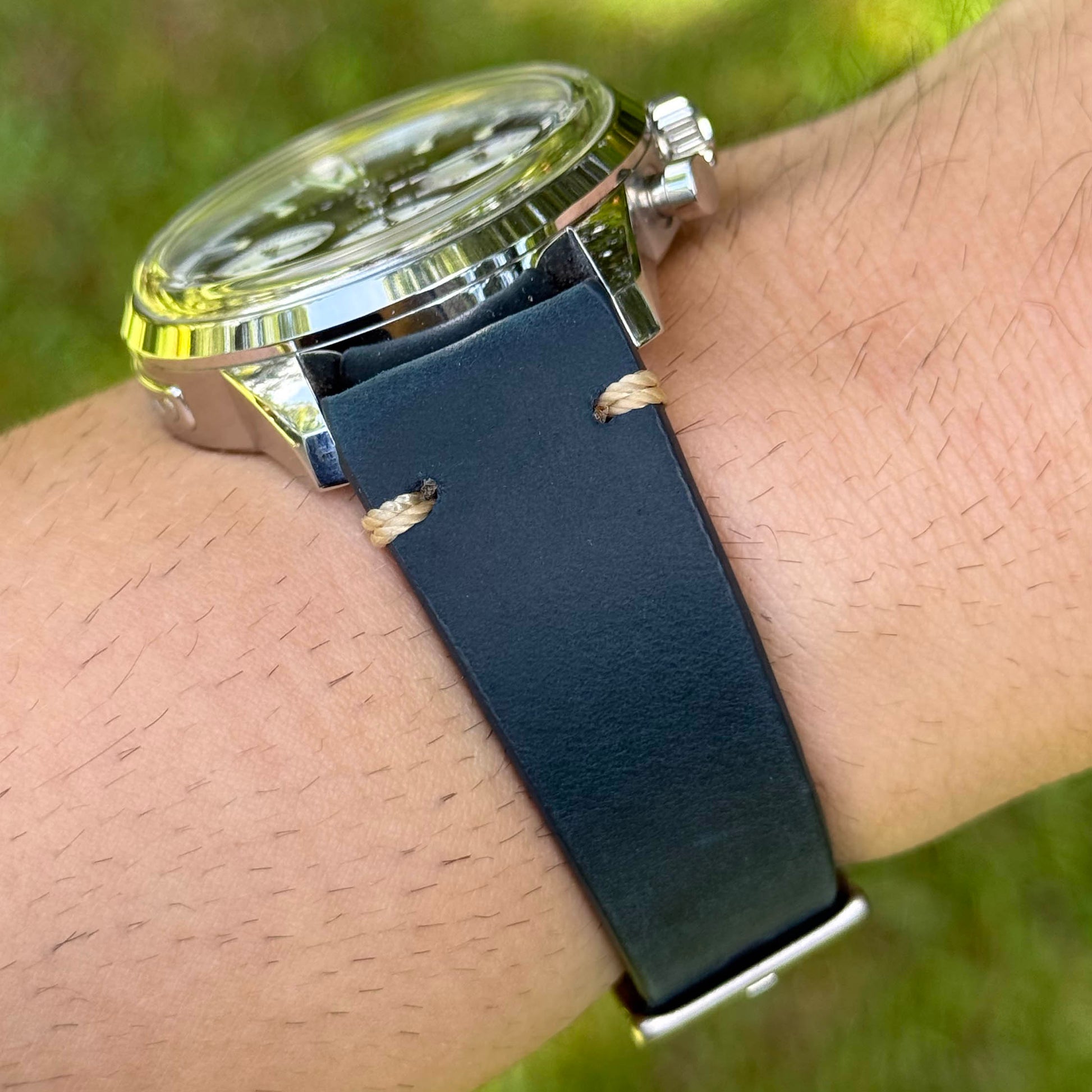 Wrist shot of the Madrid midnight blue full grain leather watch strap. 18mm, 19mm, 20mm, 21mm, 22mm, 24mm. Watch And Strap.