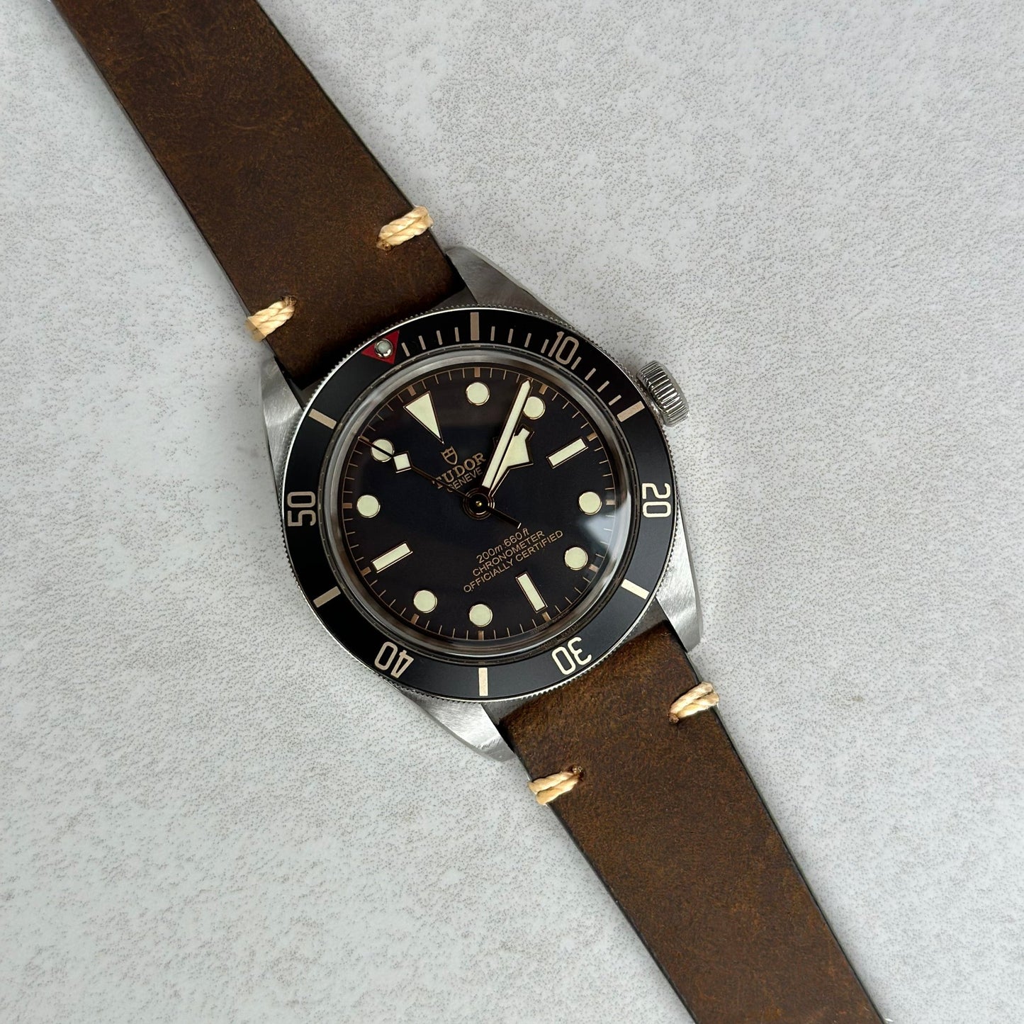 Chocolate brown full grain leather watch strap on the Tudor Blackbay 58. Contrast ivory stitching. Watch And Strap.