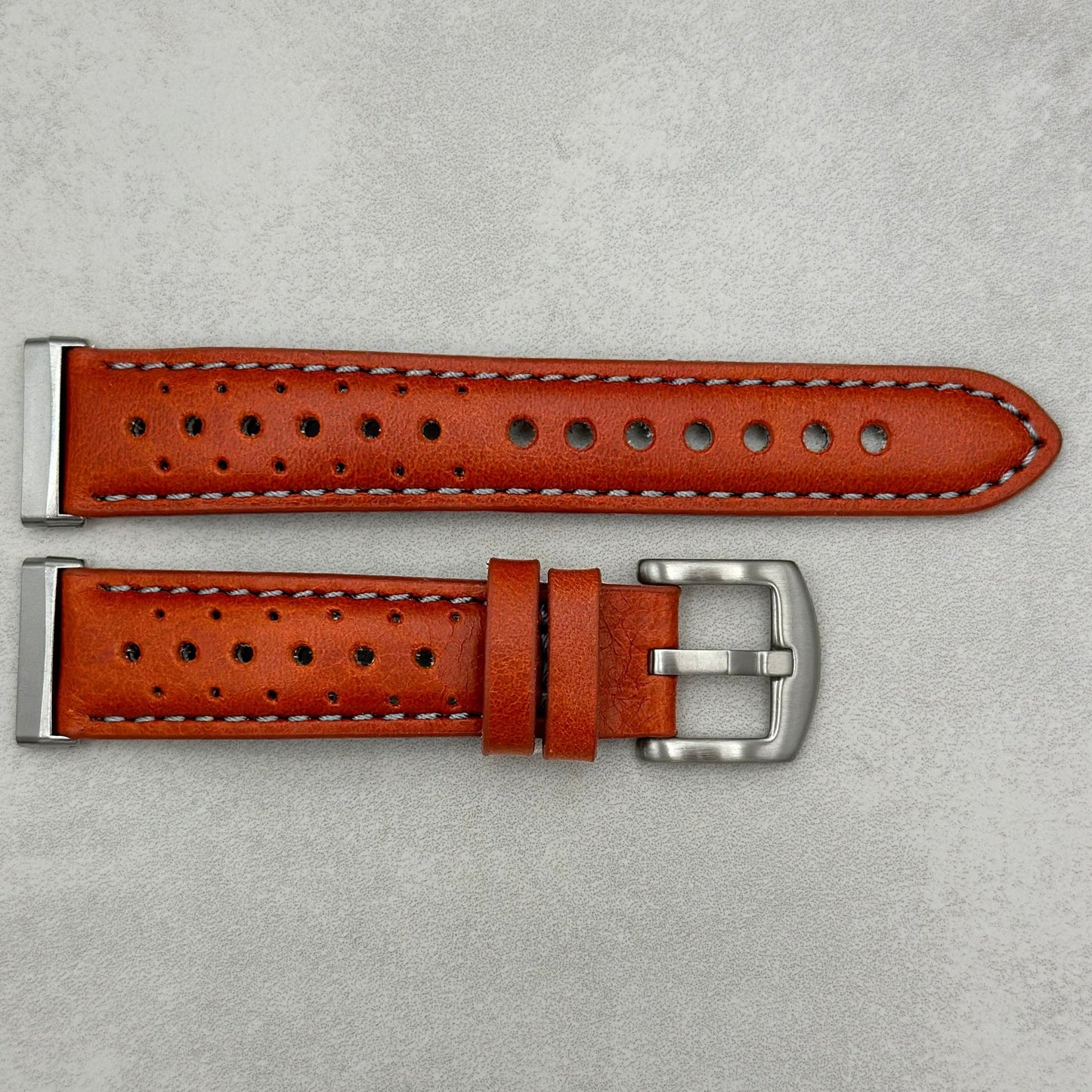 The Monte Carlo: Russet Orange Perforated Leather Fitbit Versa/Sense Watch Strap