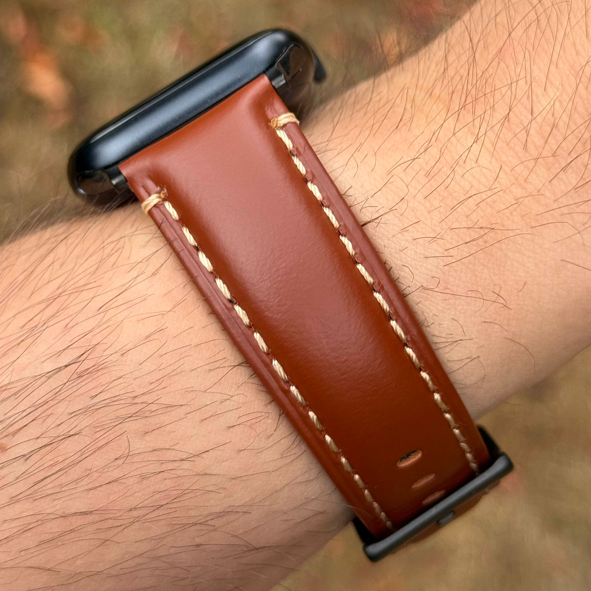 Oslo caramel brown full grain leather Apple Watch strap. Contrast ivory stitching. Series 9, 10, 11, 12, SE and Ultra.