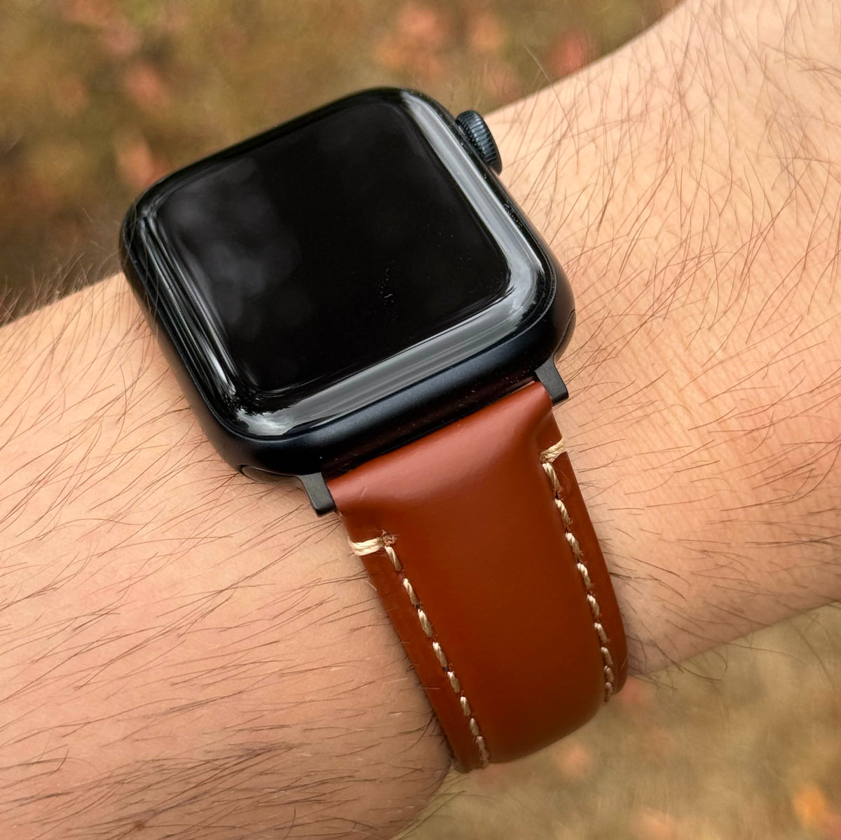 Oslo caramel brown full grain leather Apple Watch strap. Contrast ivory stitching. Series 9, 10, 11, 12, SE and Ultra.