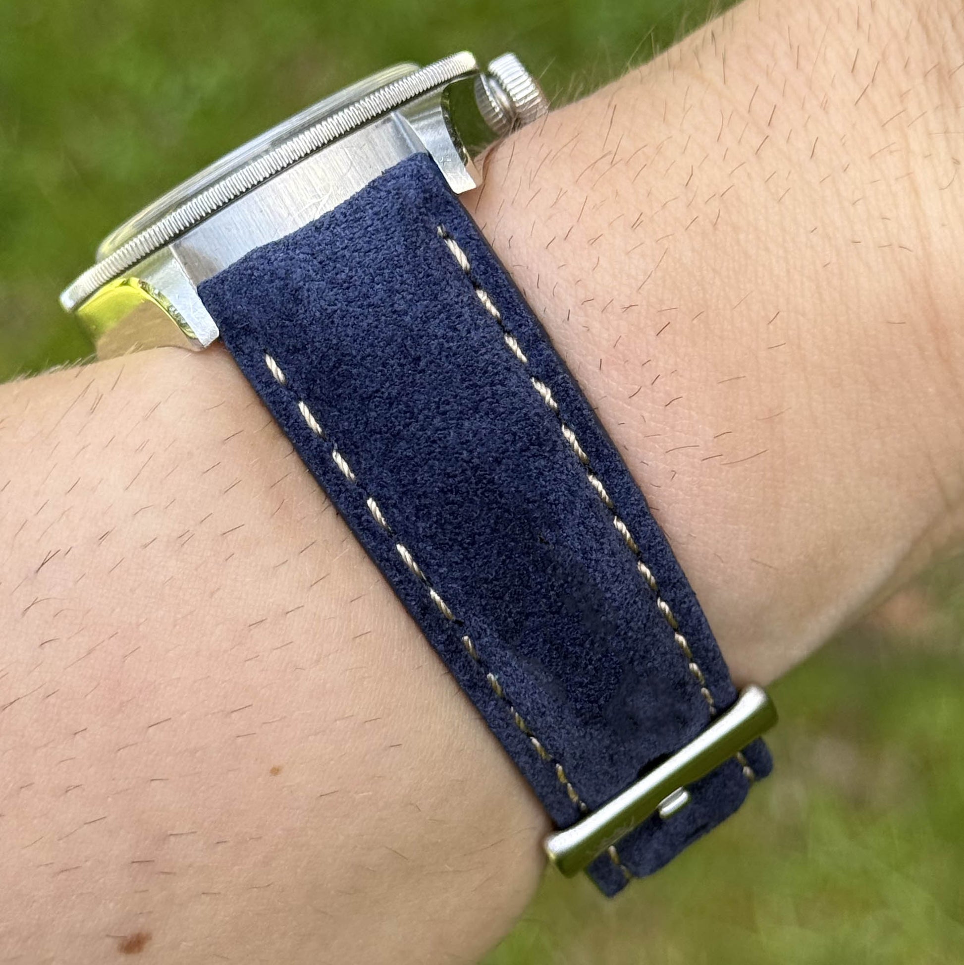 Wrist shot of the Paris Navy blue suede watch strap. Ivory stitching. 18mm, 20mm, 22mm, 24mm. Watch And Strap