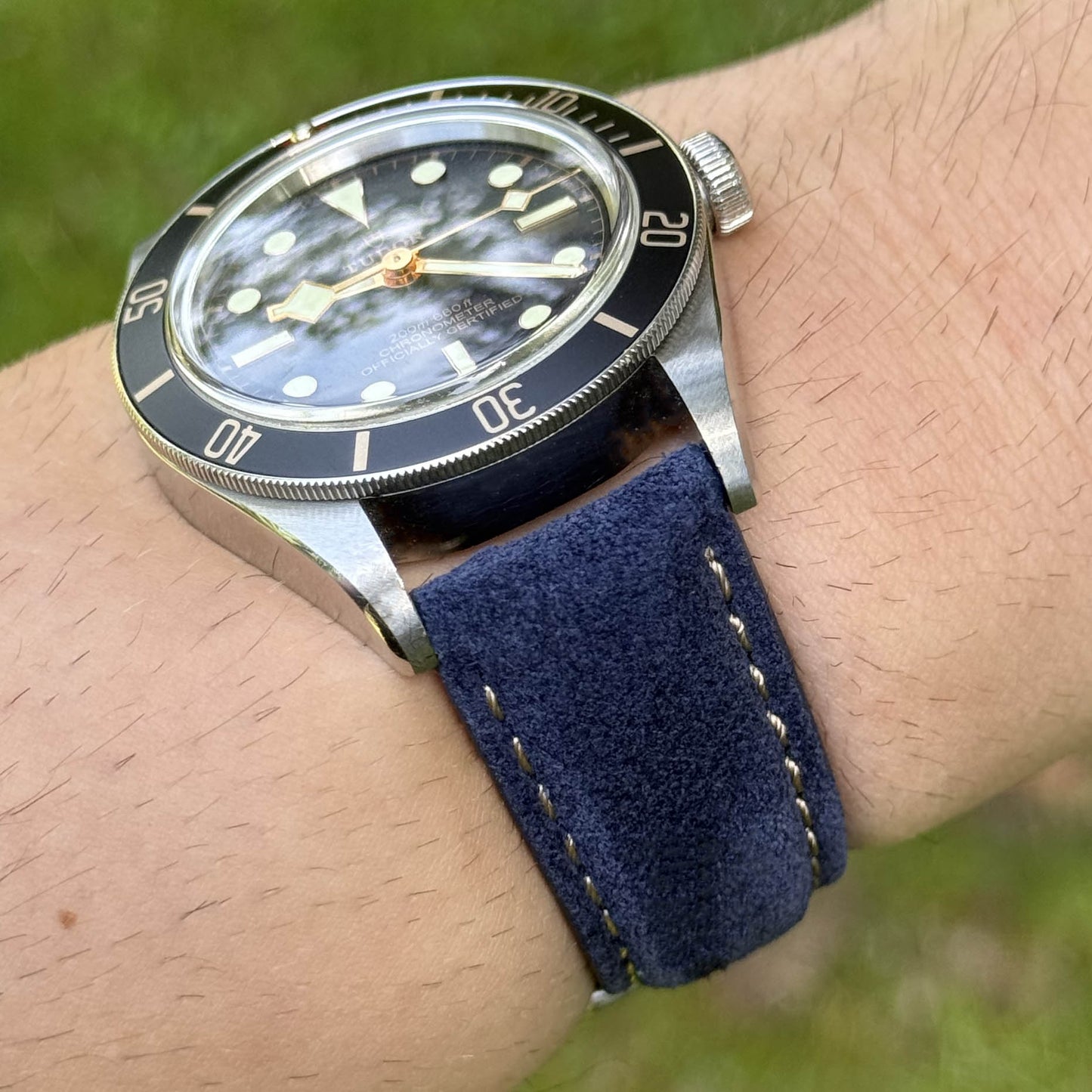 Wrist shot of the Paris navy blue suede strap on the Tudor Blackbay 58.