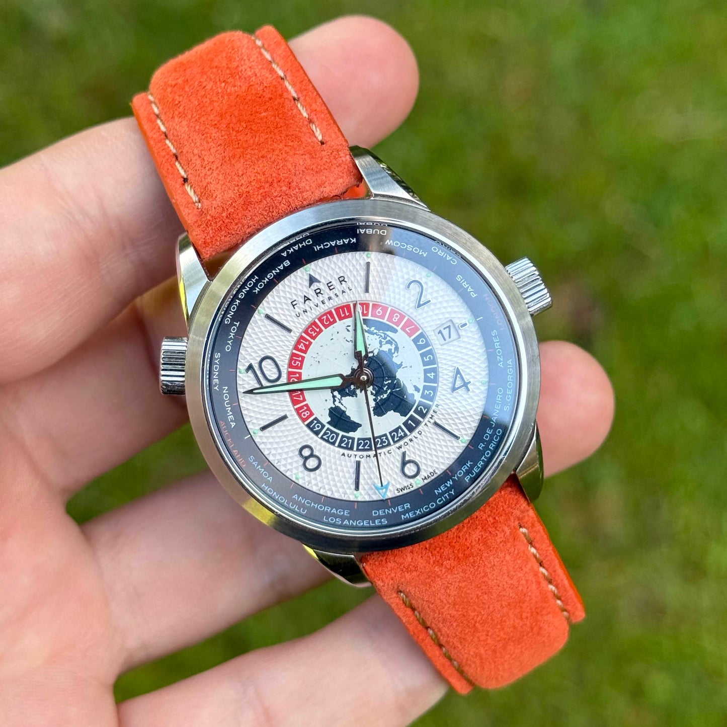 Wrist shot of the Paris orange suede watch strap. Ivory stitching. 18mm, 20mm, 22mm, 24mm. Watch And Strap