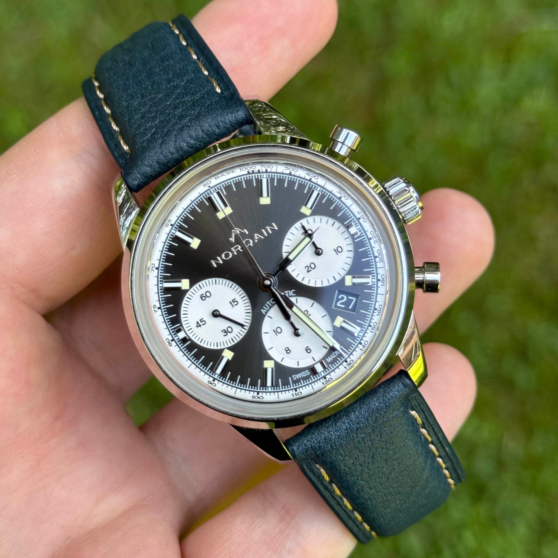 Wrist shot of the Rome Prussian blue full grain Italian leather watch strap with ivory stitching. Watch And Strap.