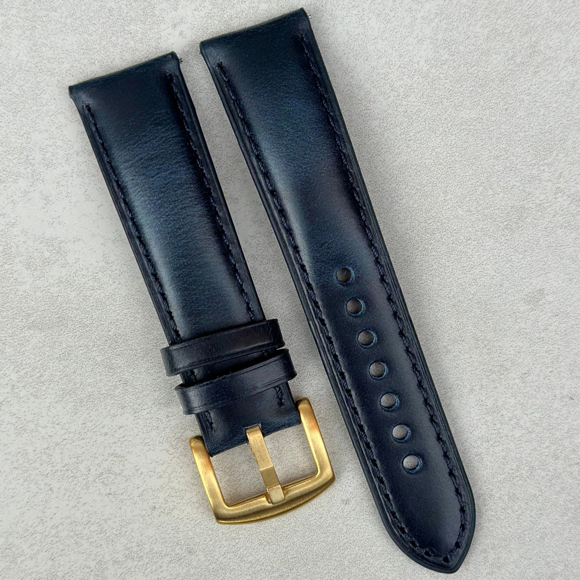 Athens deep ocean blue full grain leather watch strap. Fitted with a PVD gold 316L stainless steel buckle.