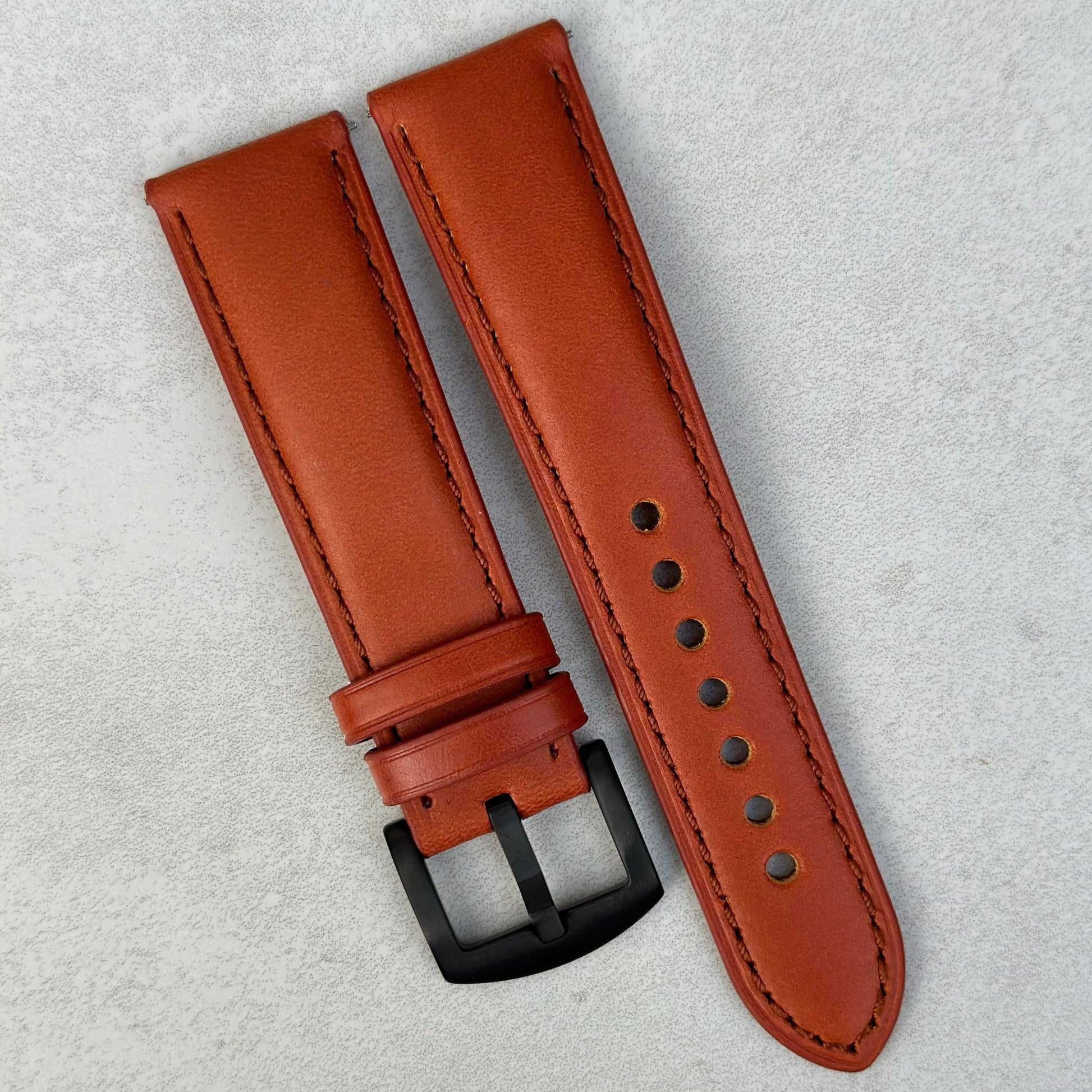 Athens burnt cinnamon full grain leather watch strap with a PVD black brushed stainless steel buckle.