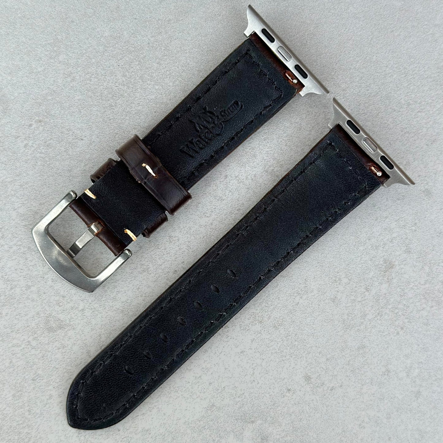 Underside of the Berlin brown full grain leather Apple Watch Strap. Watch And Strap logo.