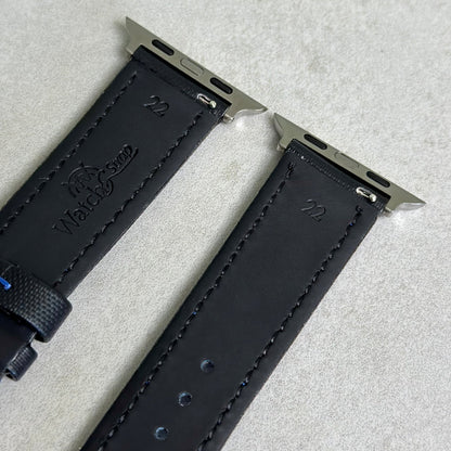 Rear of the jet black Sail cloth Apple Watch strap with blue stitching. Black leather rear. Watch And Strap