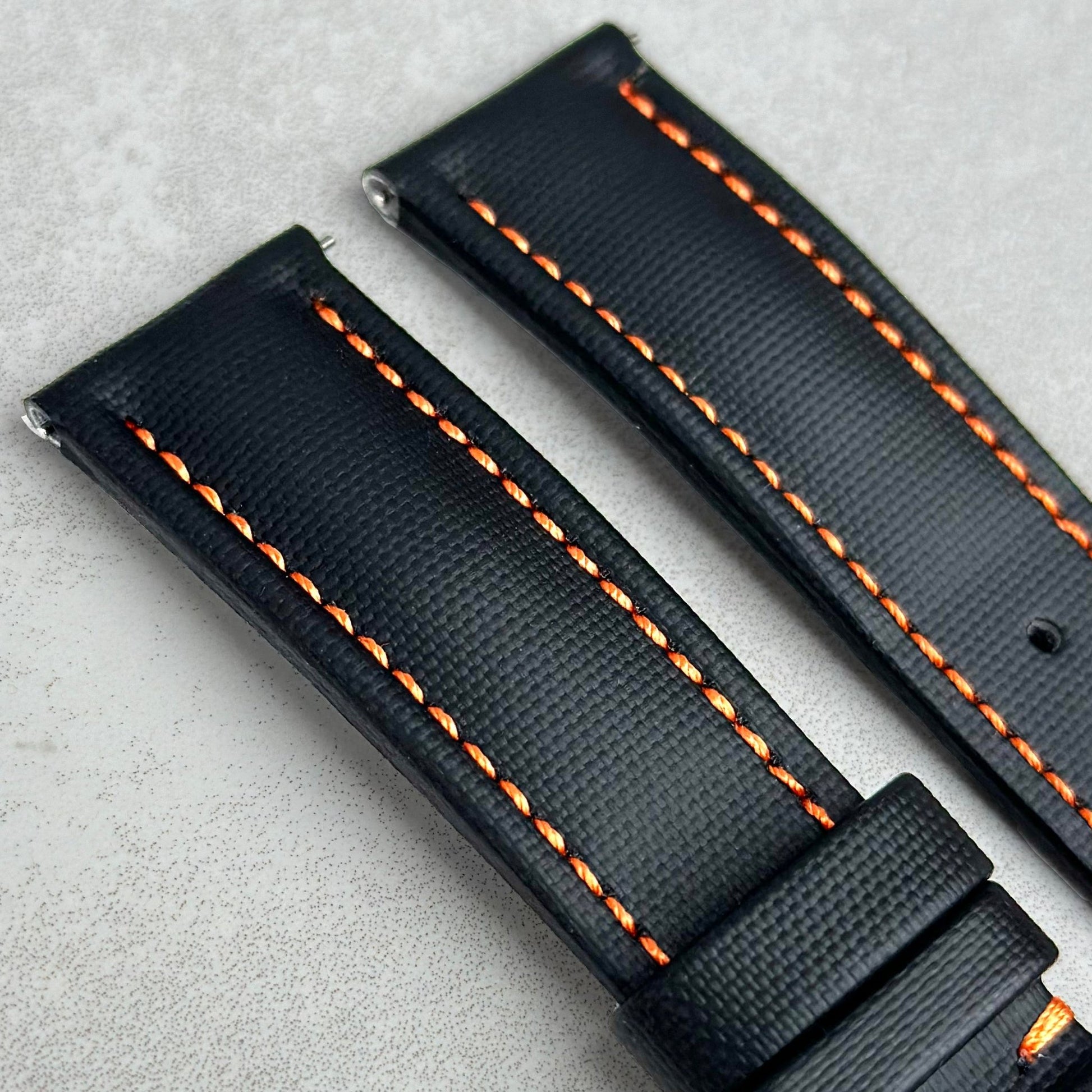 Top of the Bermuda jet black sail cloth watch strap with orange stitching. Padded sail cloth watch strap. Watch And Strap