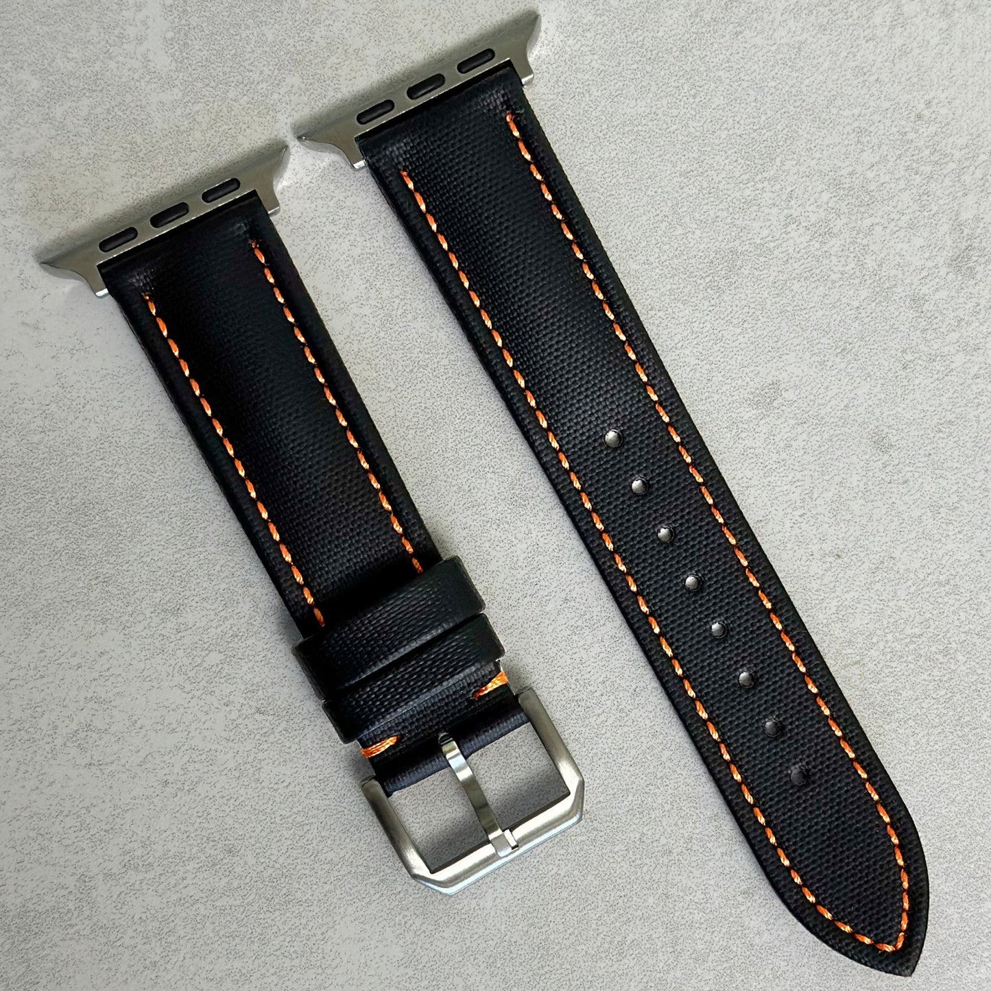 The Bermuda: Jet Black Sail Cloth Apple Watch Strap With Contrast Orange Stitching